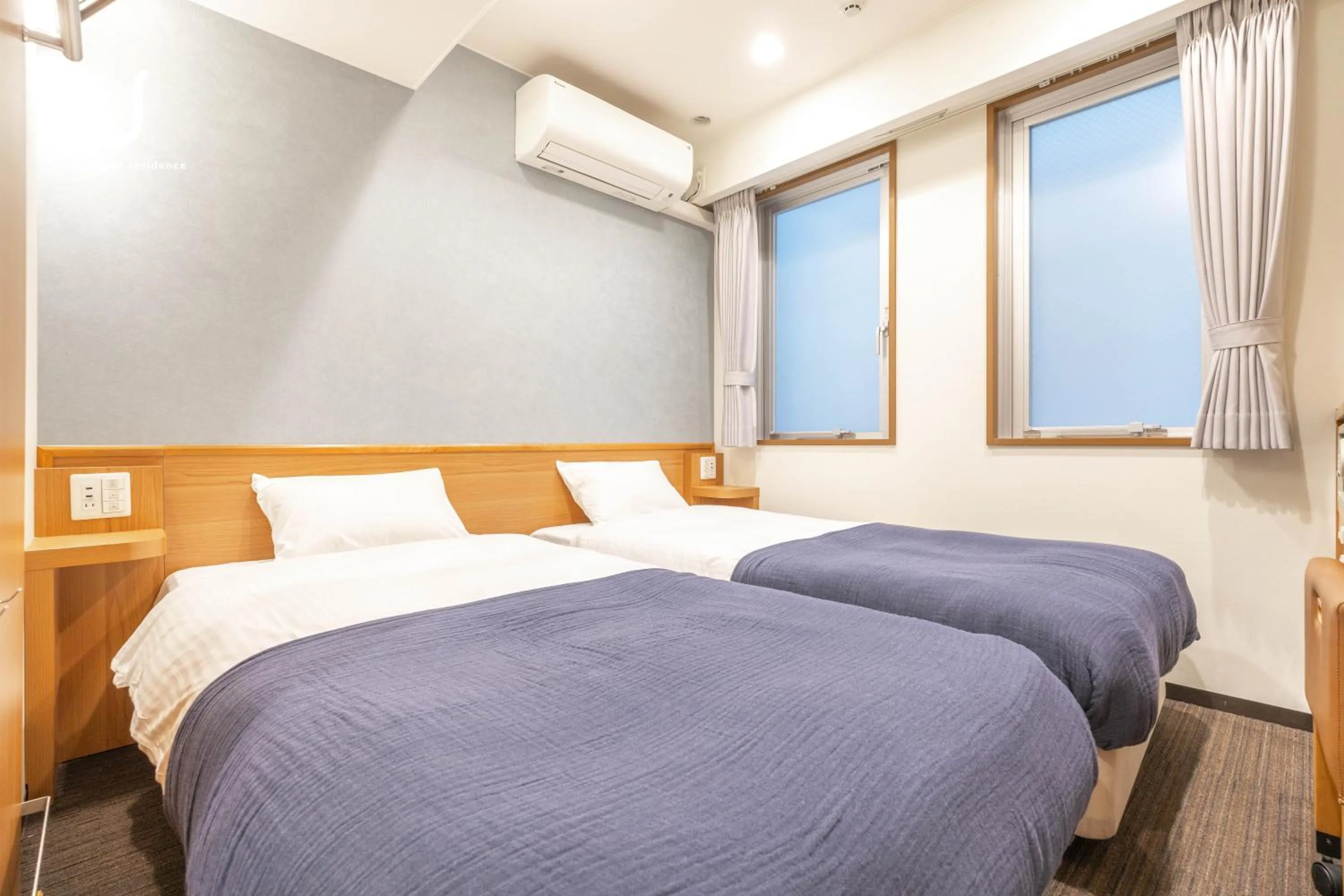 Bed in unito hotel residence Kyoto Station North