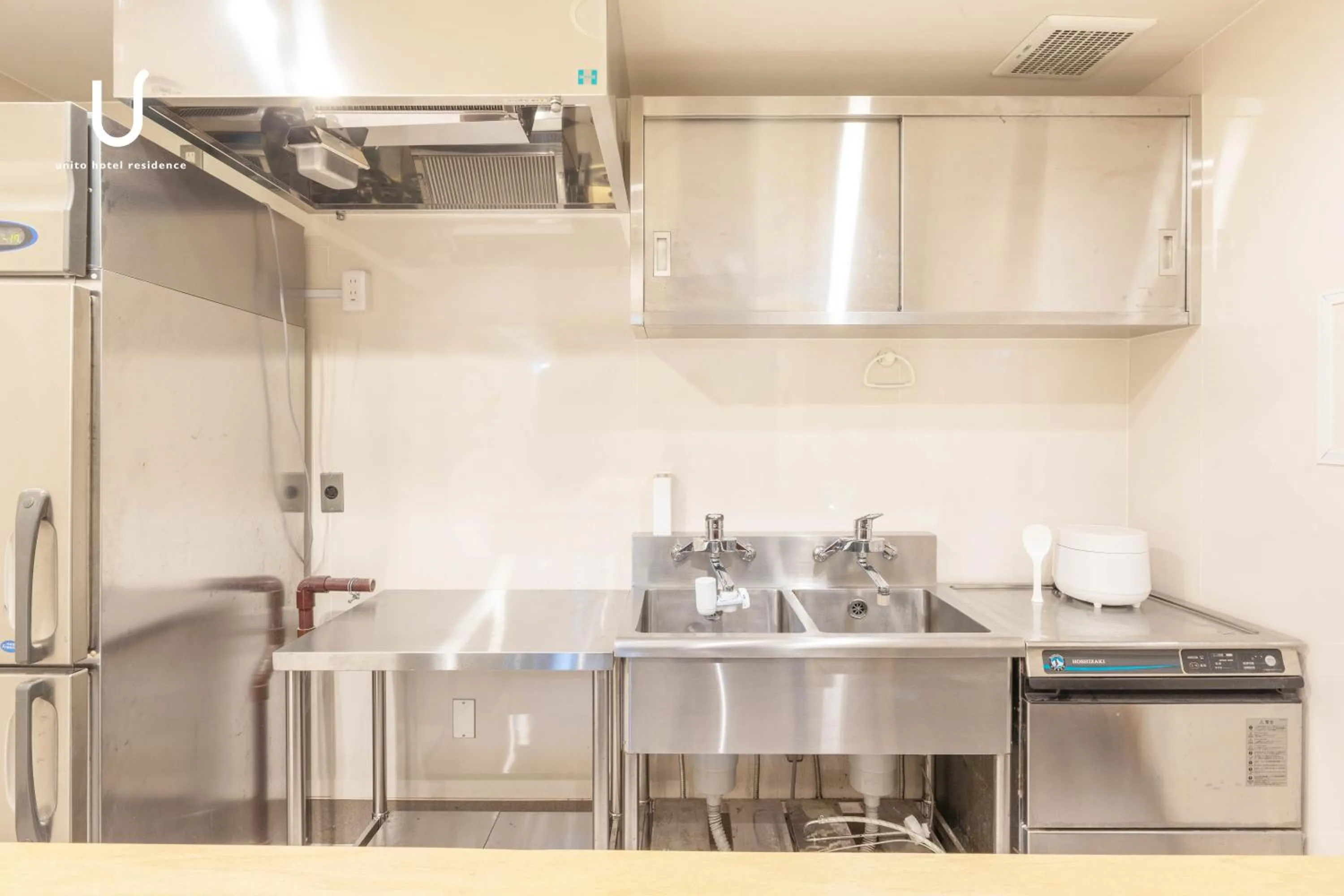 Communal kitchen in unito hotel residence Kyoto Station North