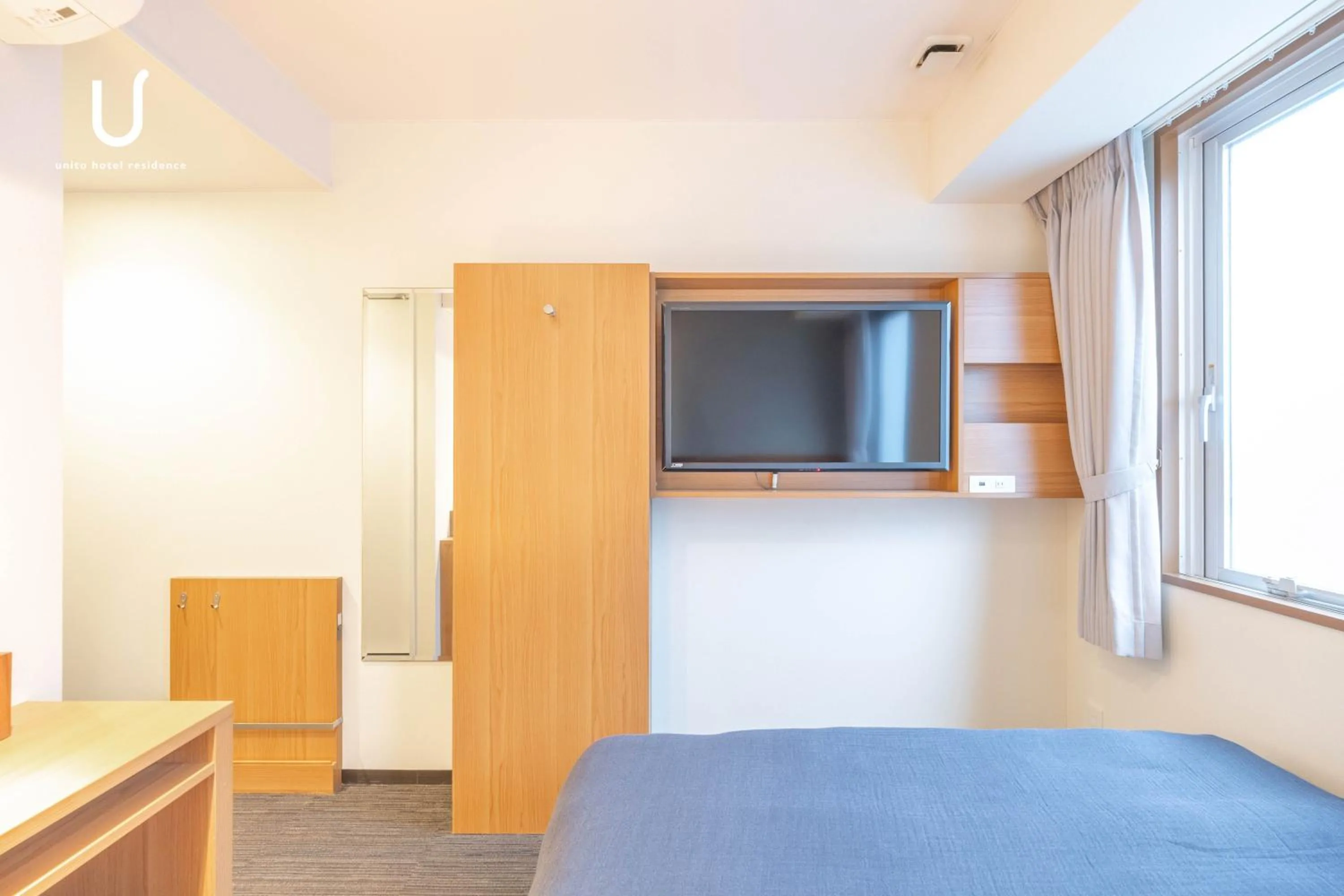 Bed in unito hotel residence Kyoto Station North
