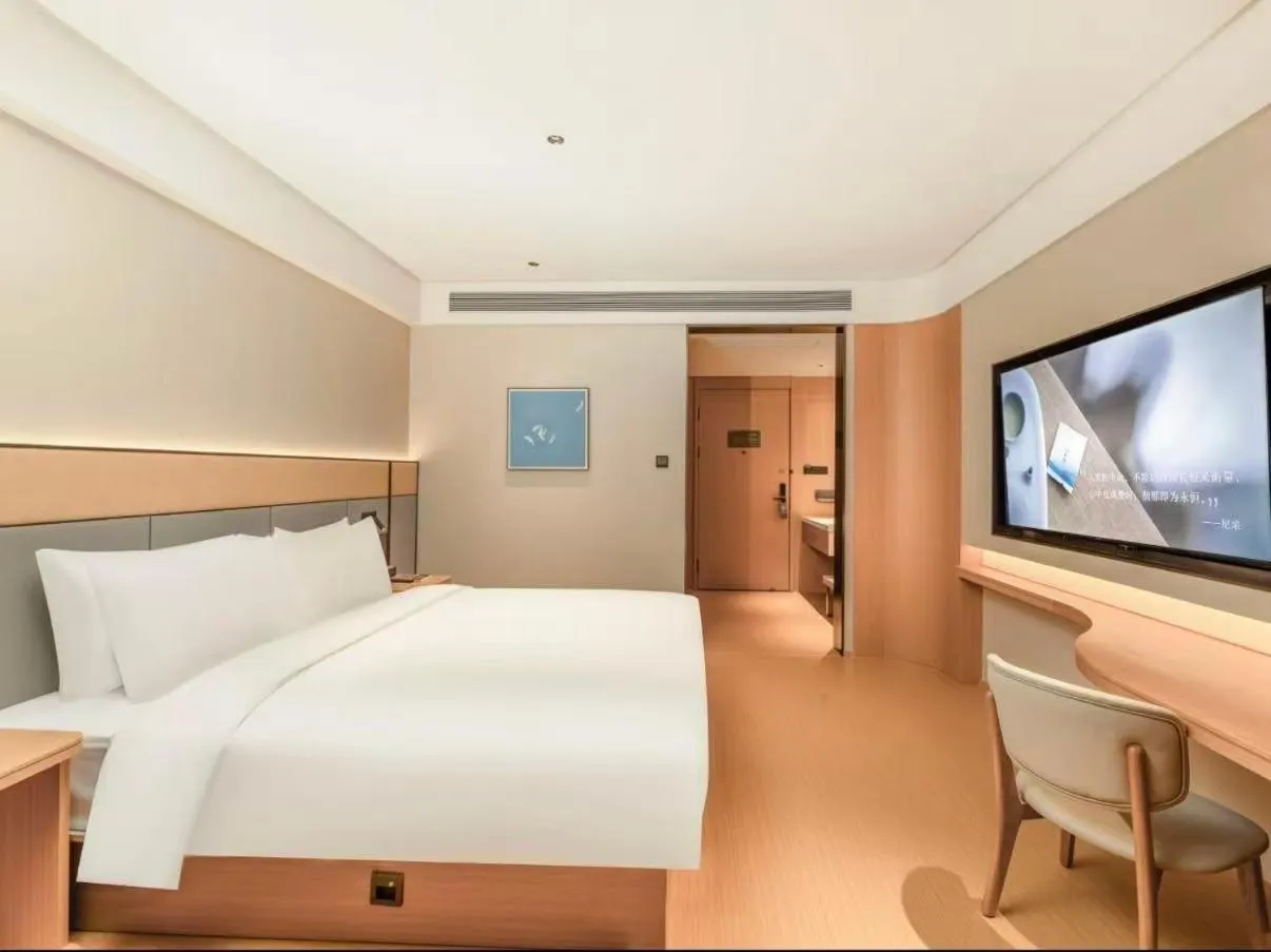 Bed in JI Hotel Suzhou Guanqian Street Chayuanchang Metro Station