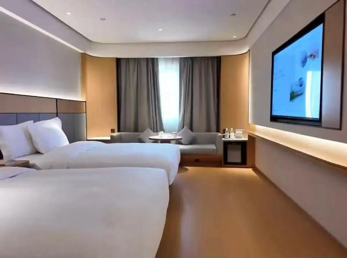 Bed in JI Hotel Suzhou Guanqian Street Chayuanchang Metro Station