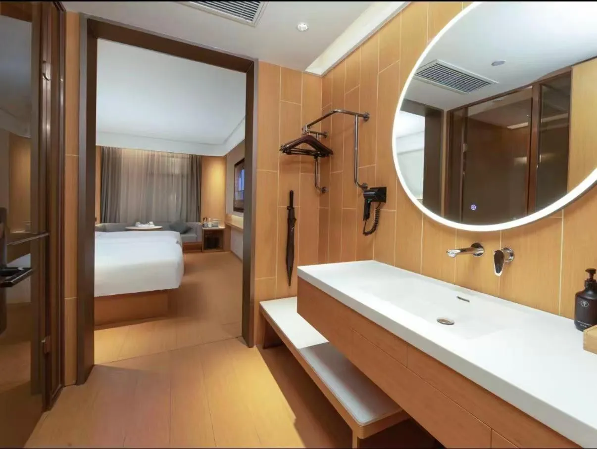 Bed in JI Hotel Suzhou Guanqian Street Chayuanchang Metro Station