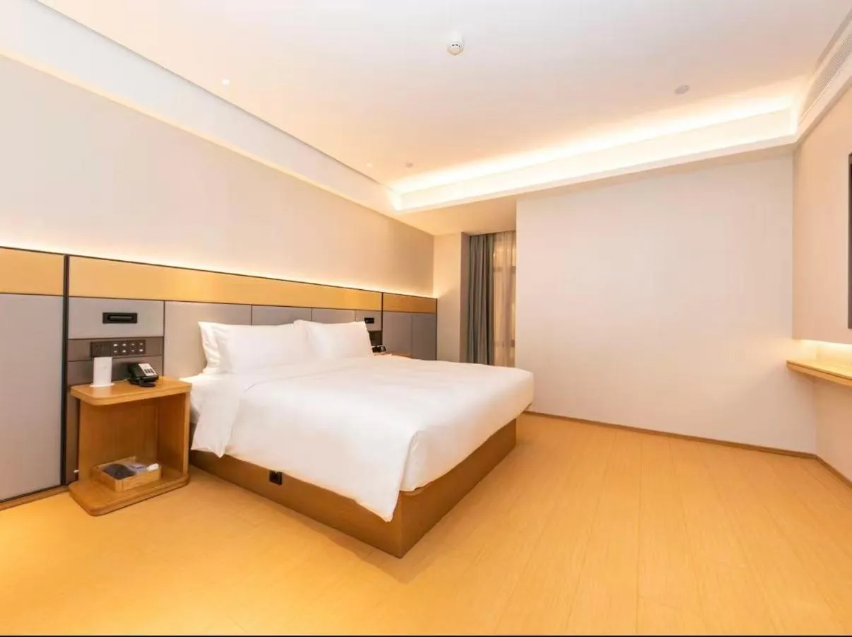 Bed in JI Hotel Suzhou Guanqian Street Chayuanchang Metro Station