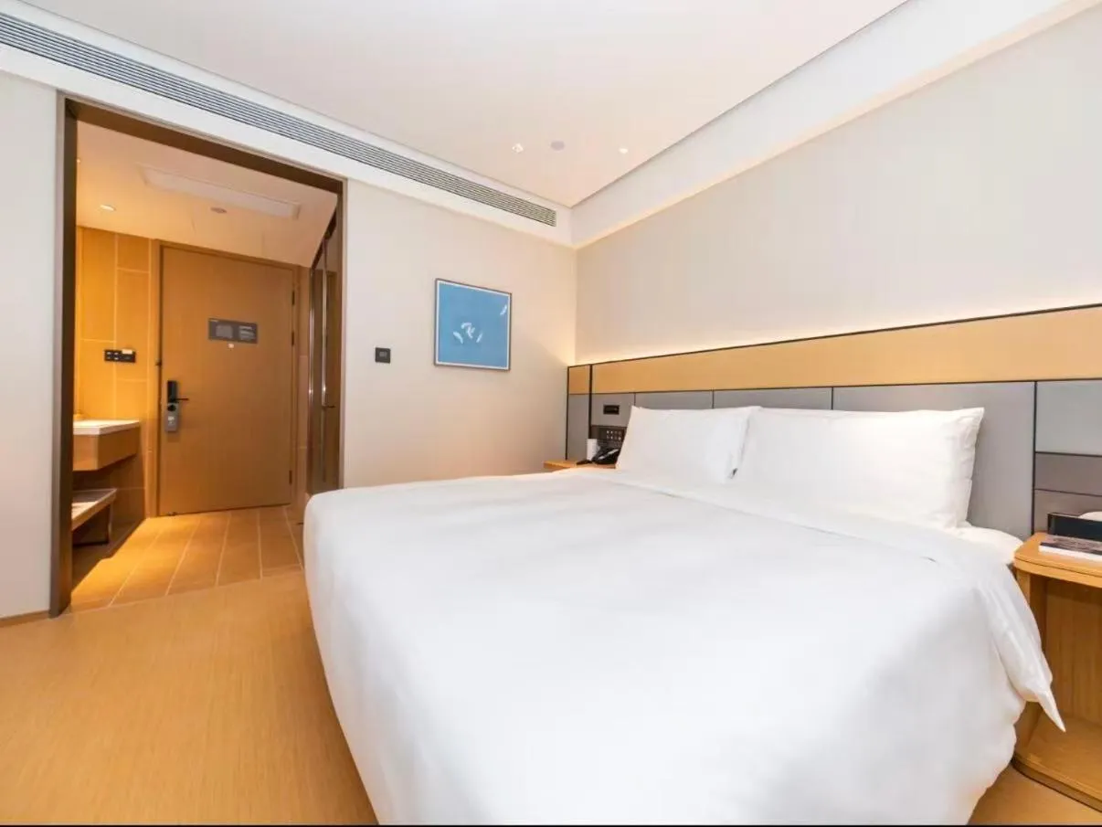 Bed in JI Hotel Suzhou Guanqian Street Chayuanchang Metro Station