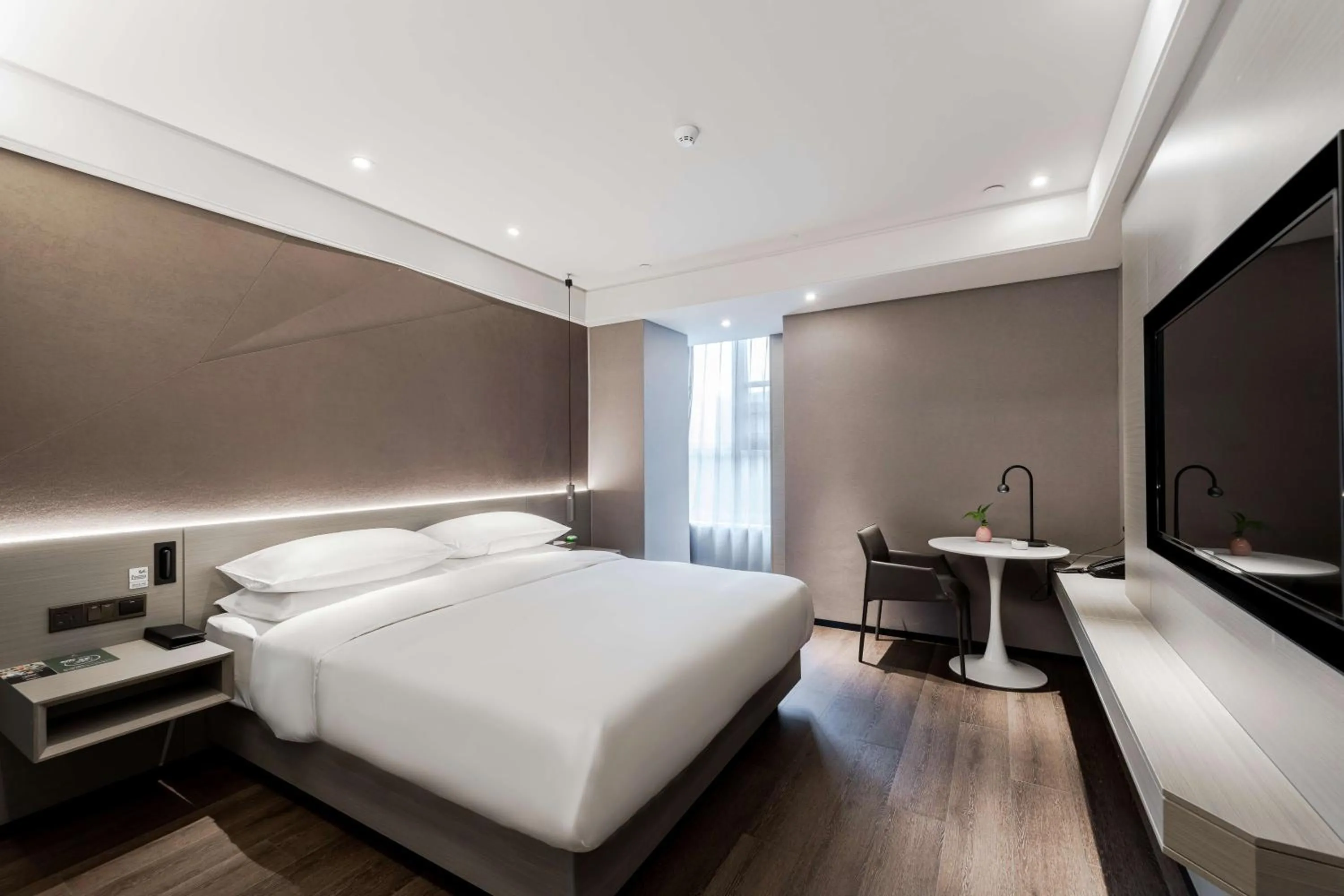Bed in Ibis Styles Suzhou Hushuguang