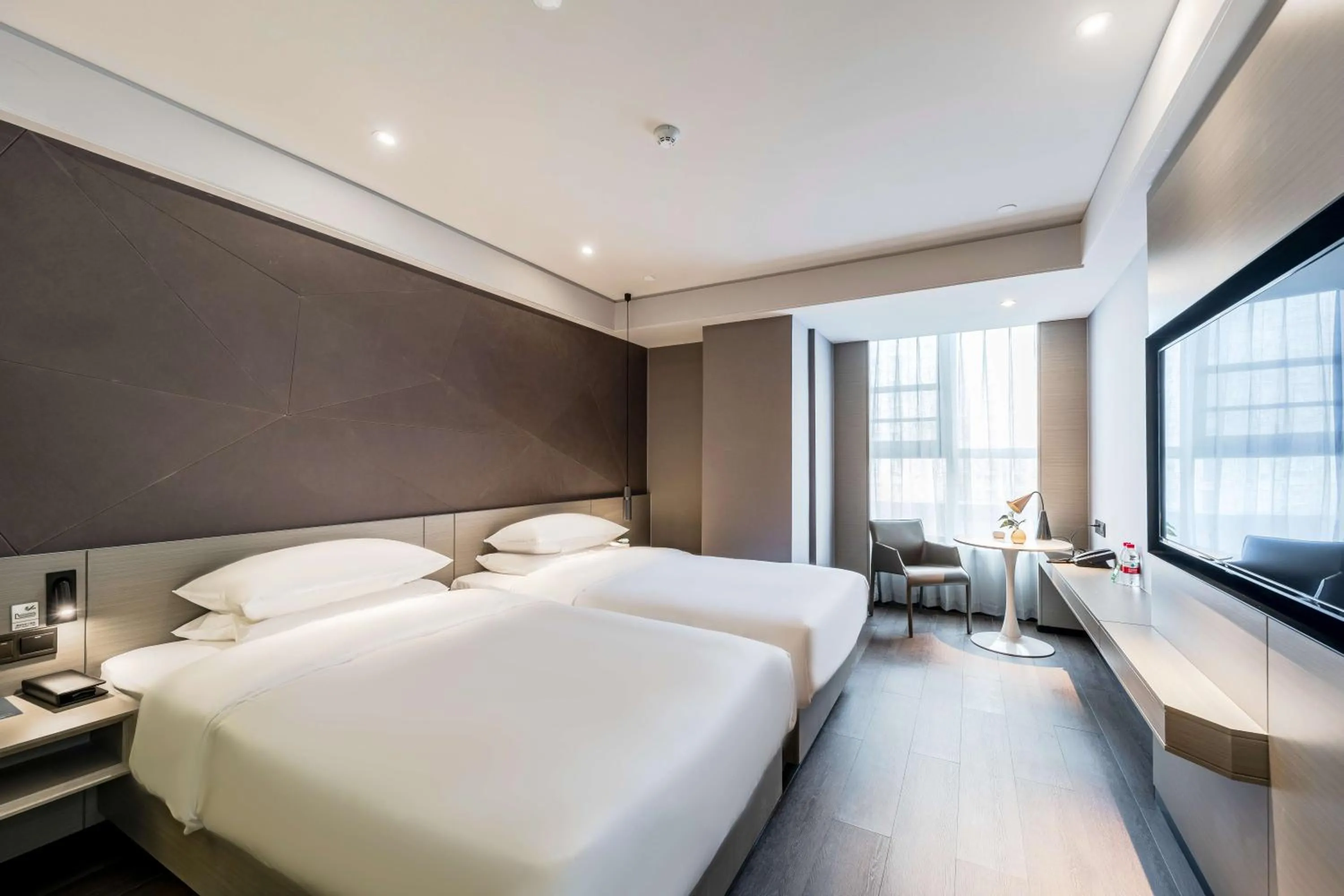 Bed in Ibis Styles Suzhou Hushuguang