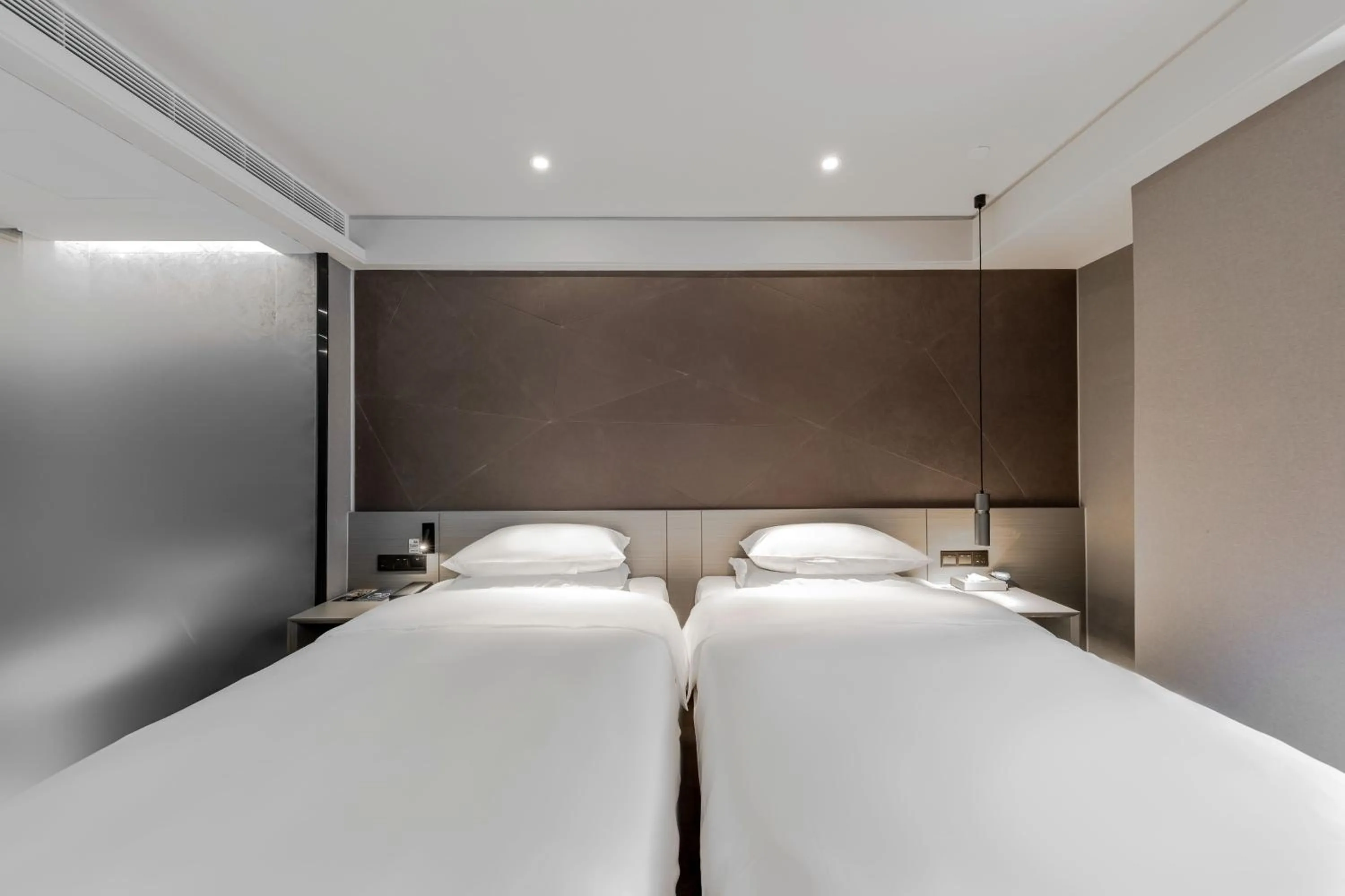 Bed in Ibis Styles Suzhou Hushuguang