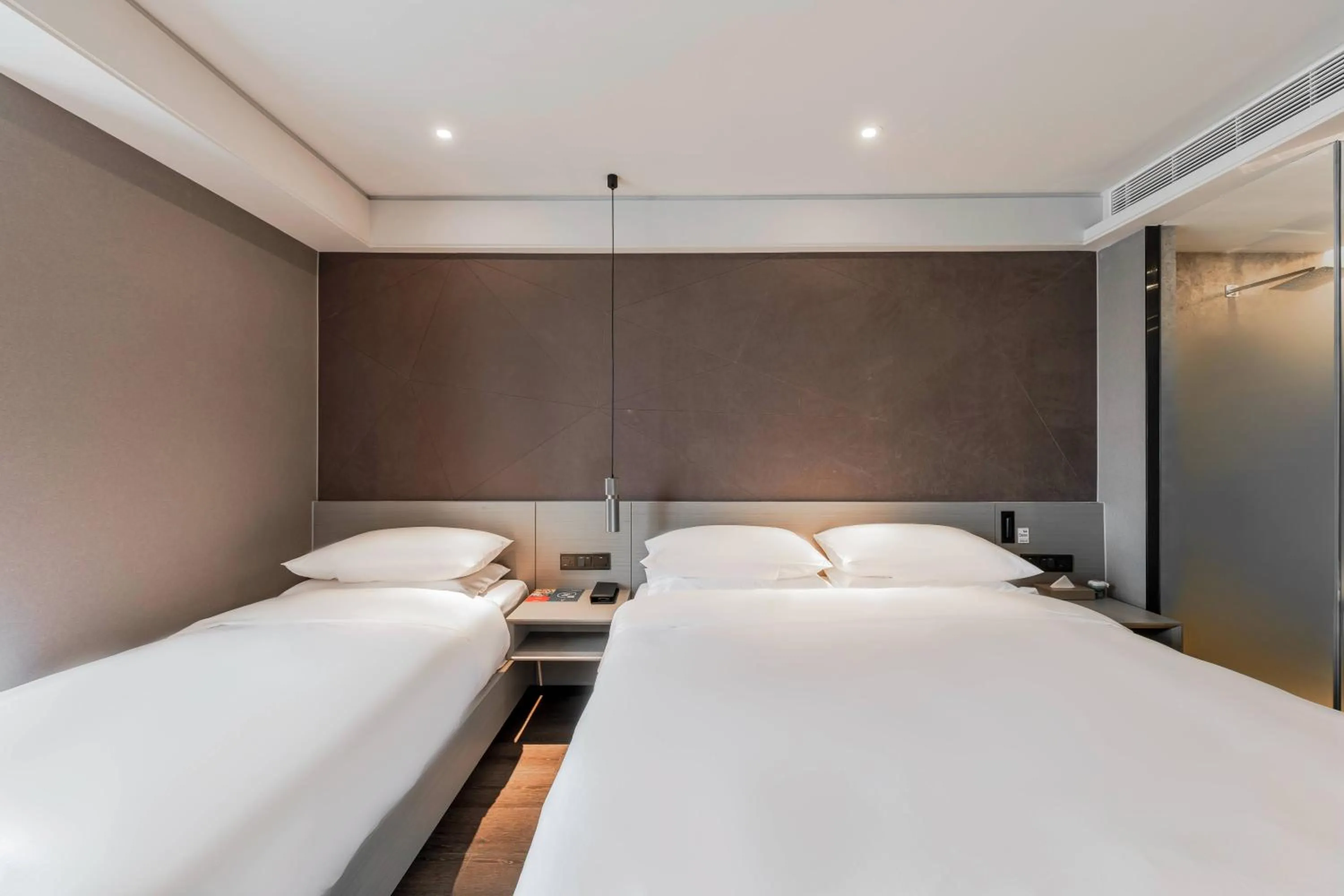 Bed in Ibis Styles Suzhou Hushuguang