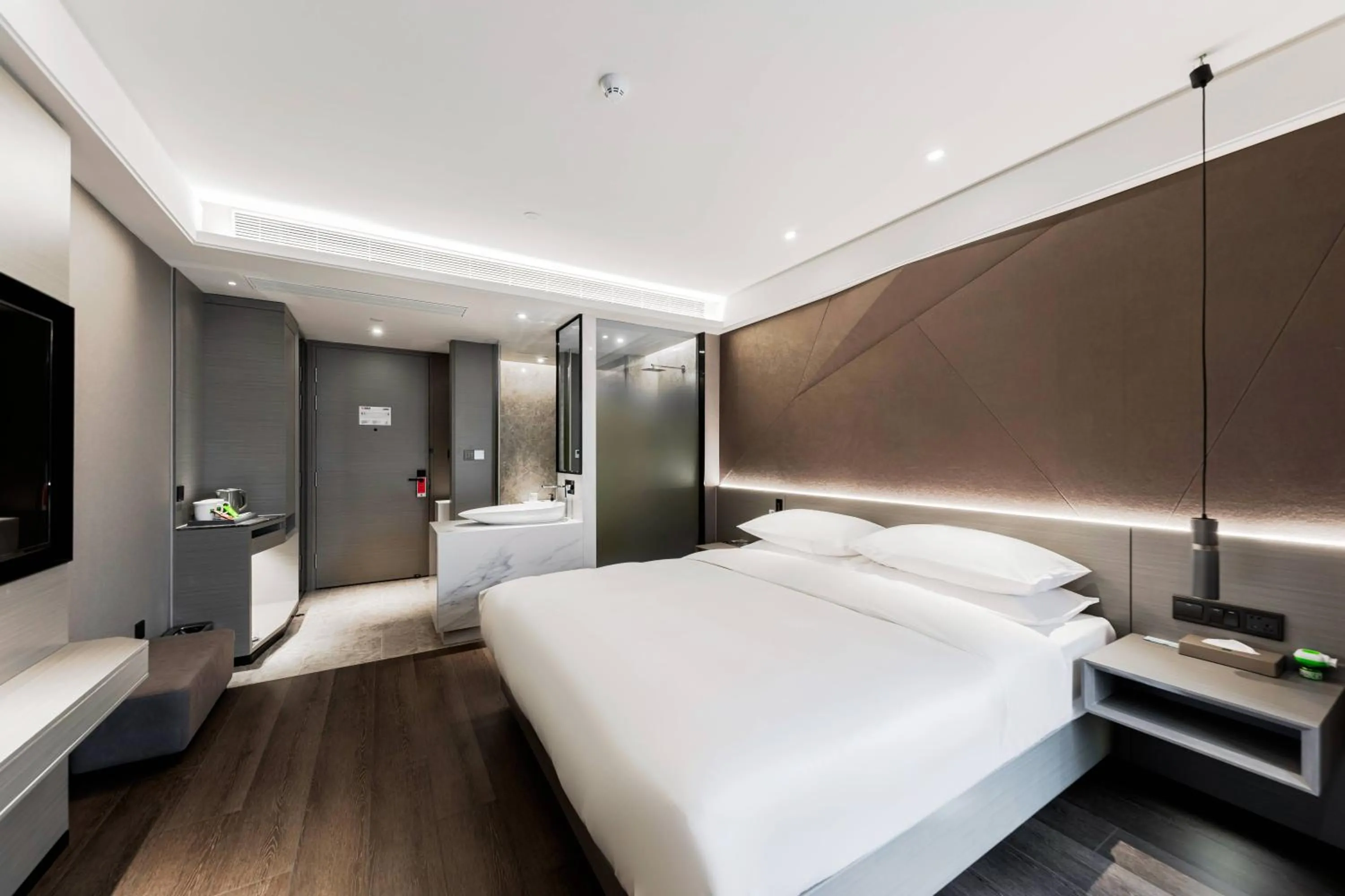 Bed in Ibis Styles Suzhou Hushuguang