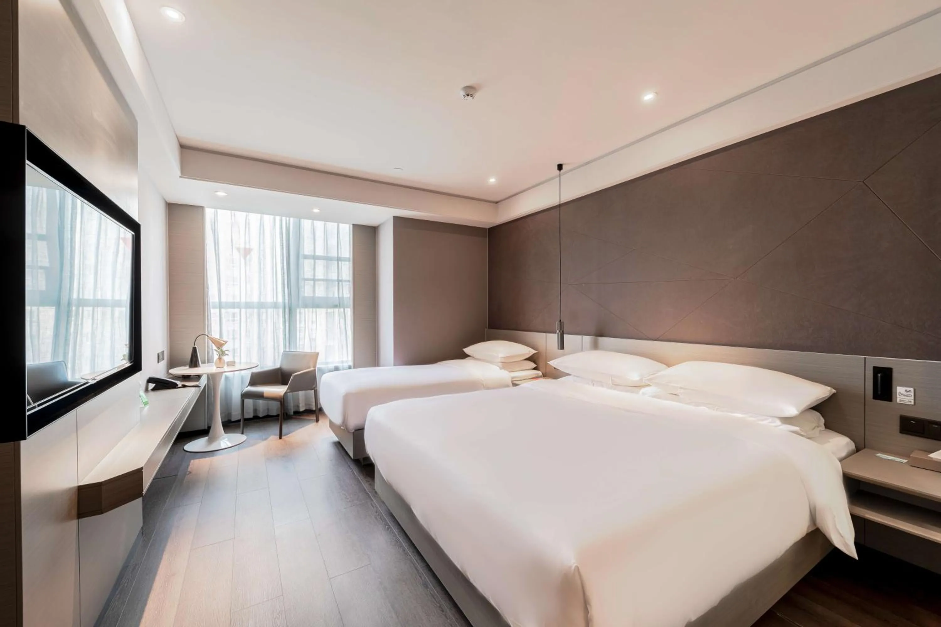 Bed in Ibis Styles Suzhou Hushuguang