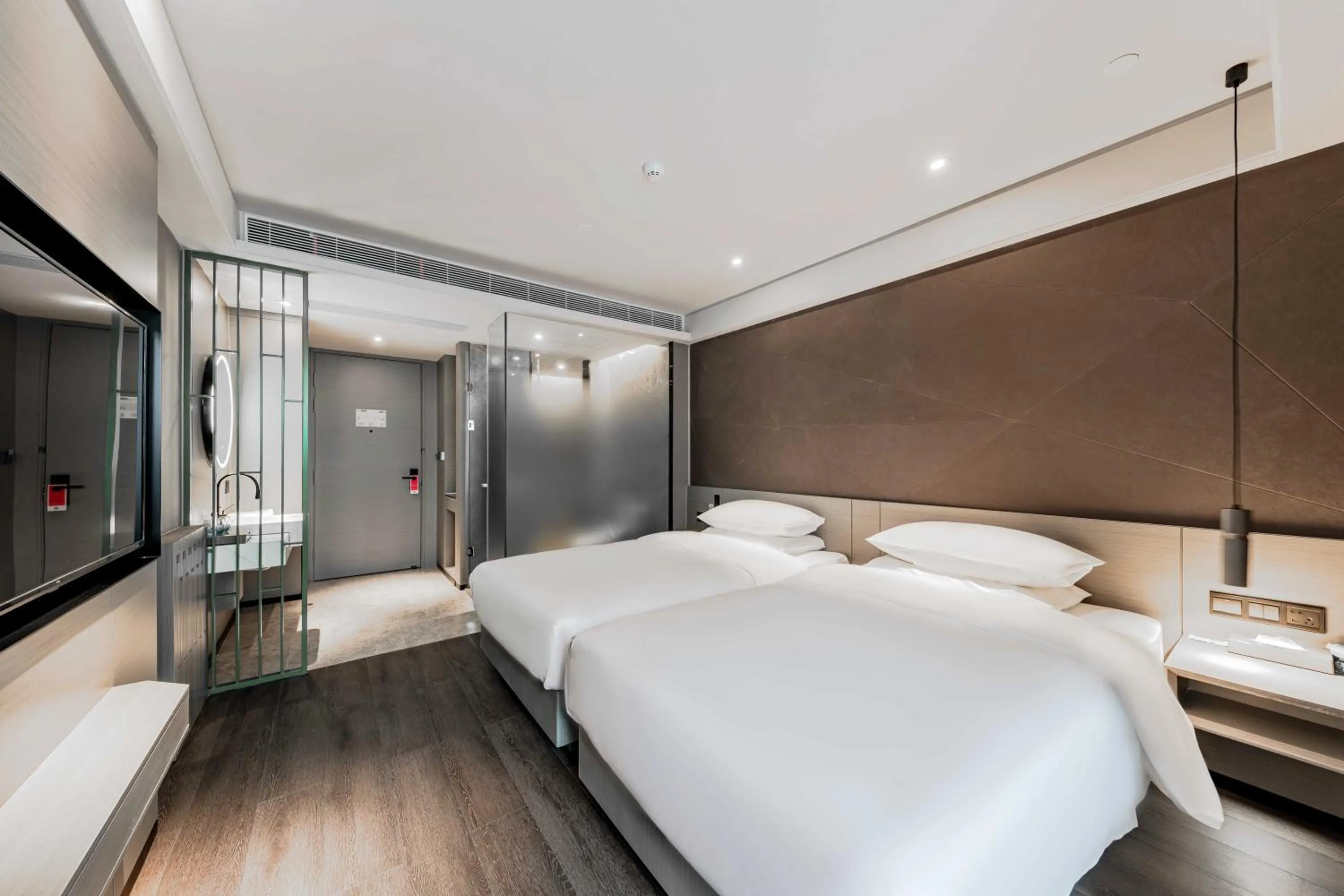 Bed in Ibis Styles Suzhou Hushuguang