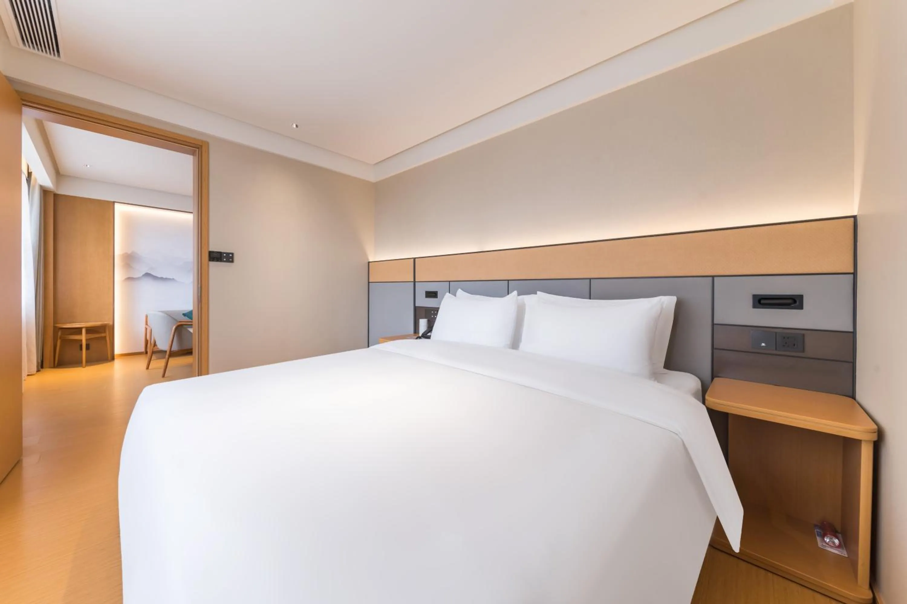 Bed in JI Hotel Guangzhou Shayuan Metro Station