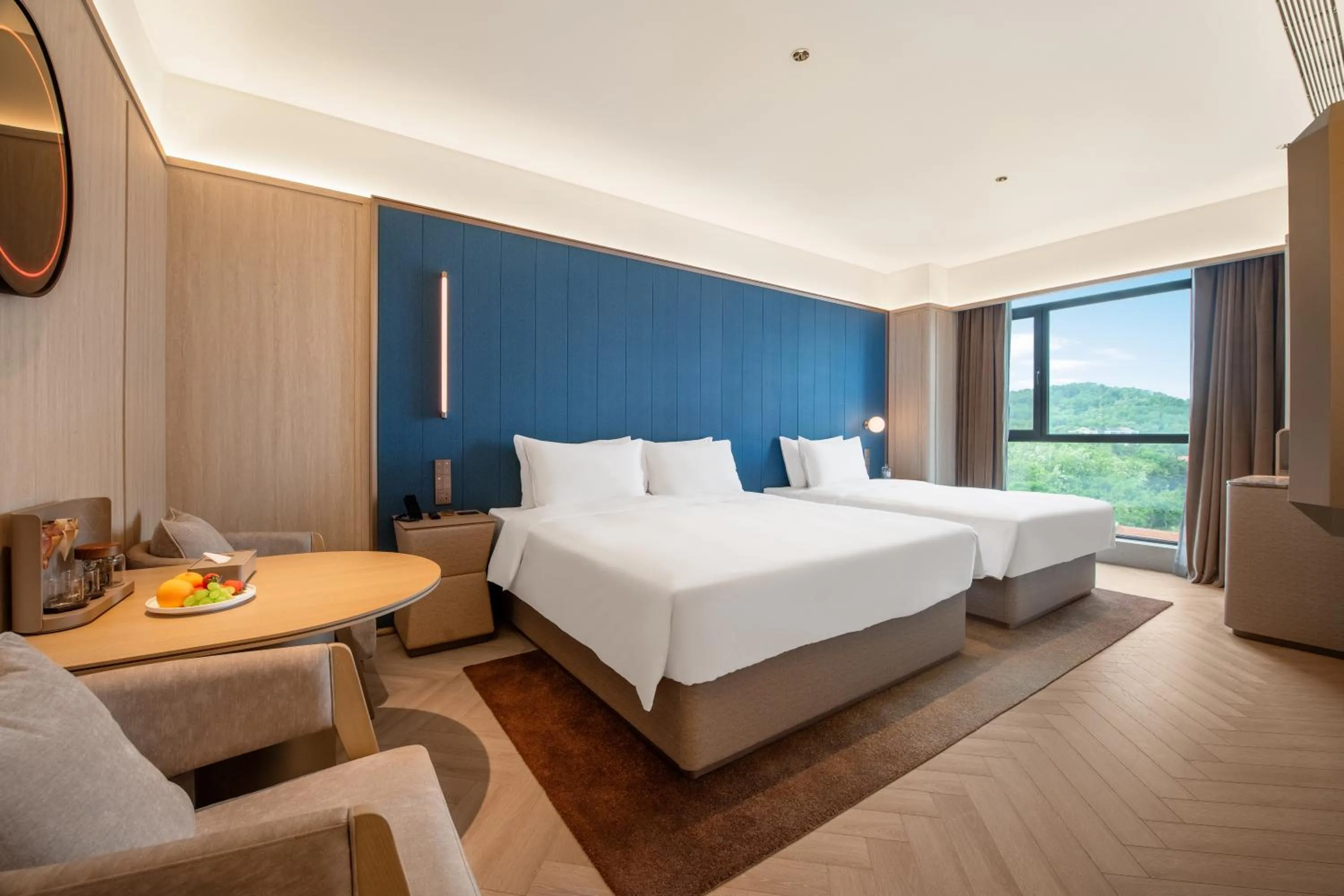 Family Room in Orange Crystal Hotel Weihai Happiness Gate Weigao Plaza