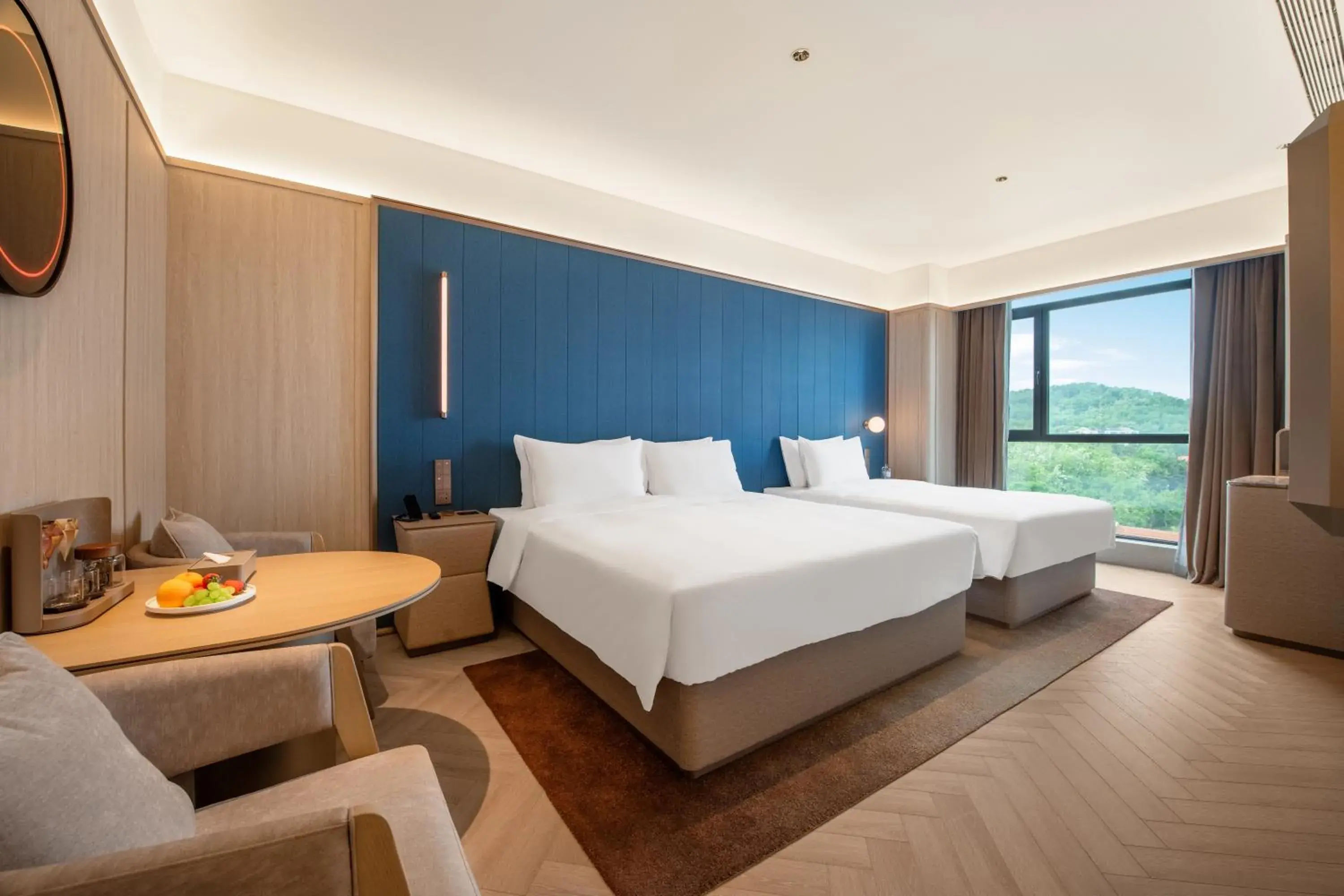 Family Room in Orange Crystal Hotel Weihai Happiness Gate Weigao Plaza Family Room in Orange Crystal Hotel Weihai Happiness Gate Weigao Plaza