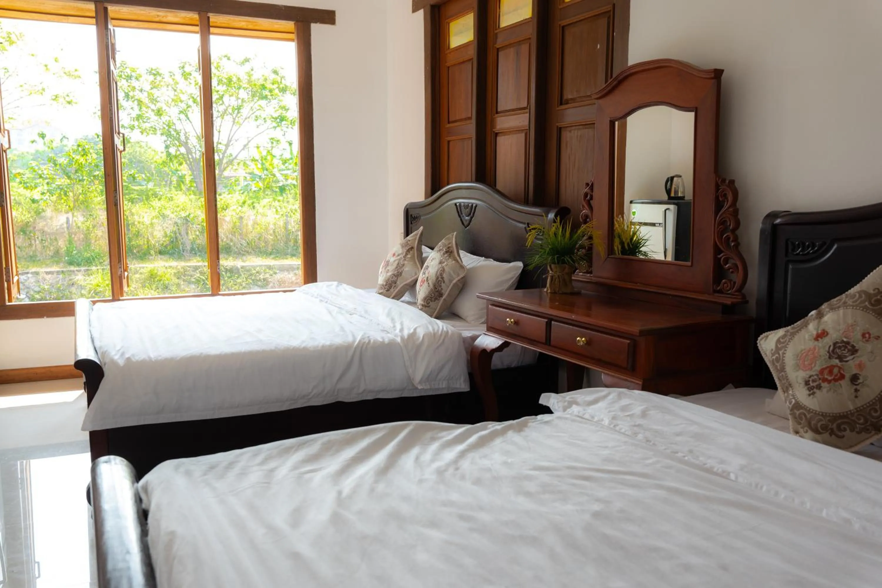 Bed in Vang Vieng Romantic Resort