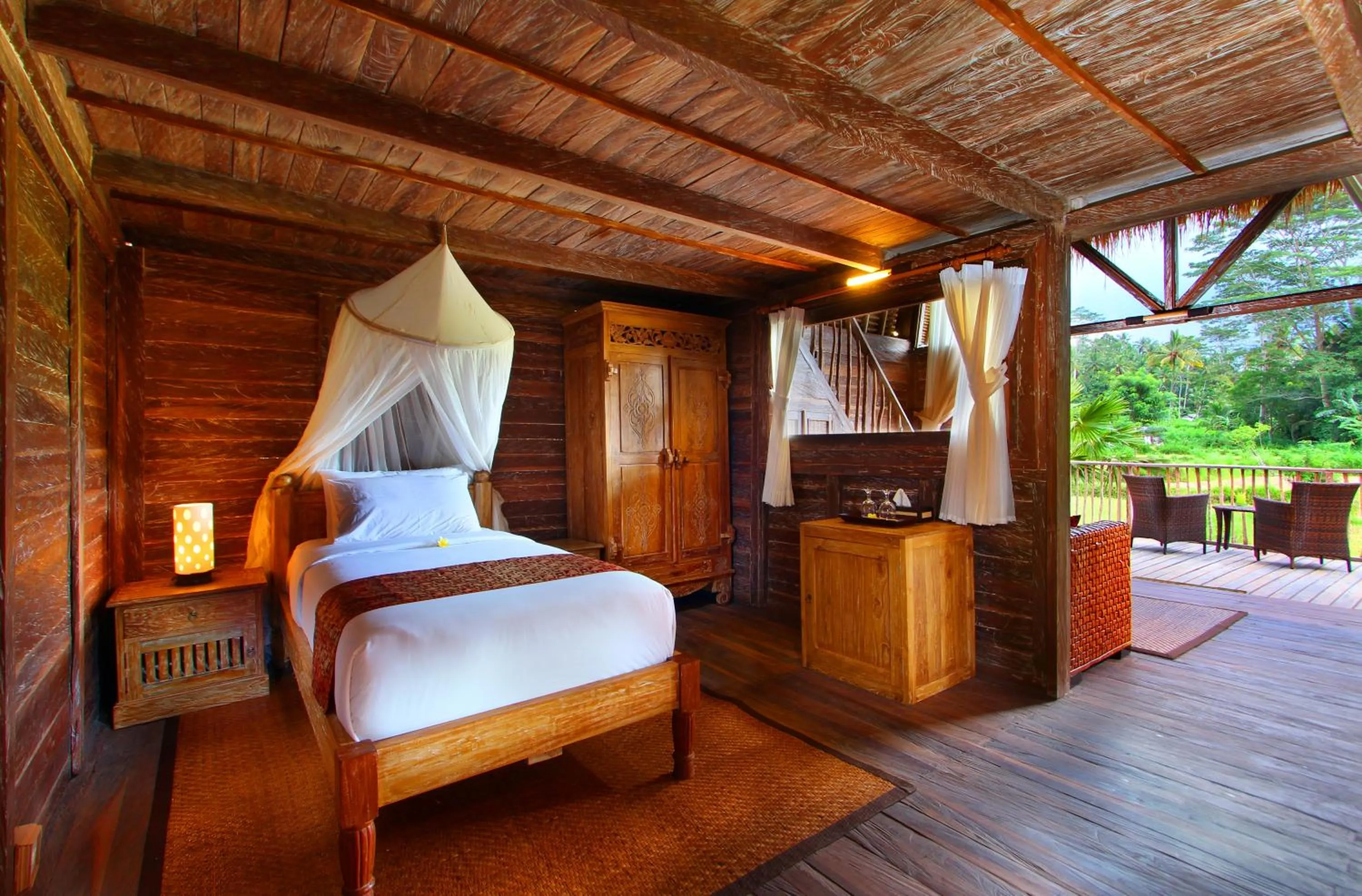 Bed in De Klumpu Bali Eco Tradi Stay