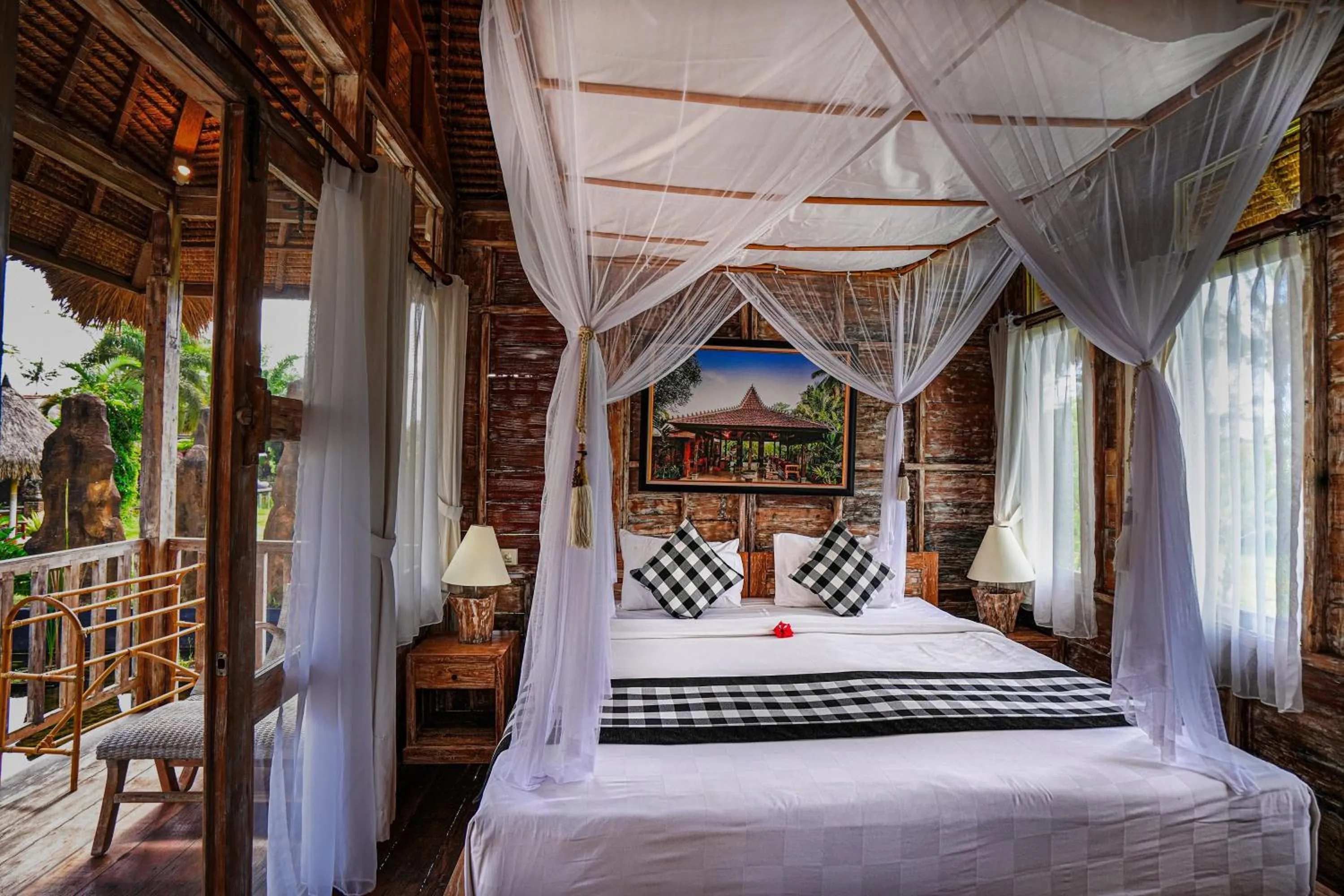 Bed in De Klumpu Bali Eco Tradi Stay