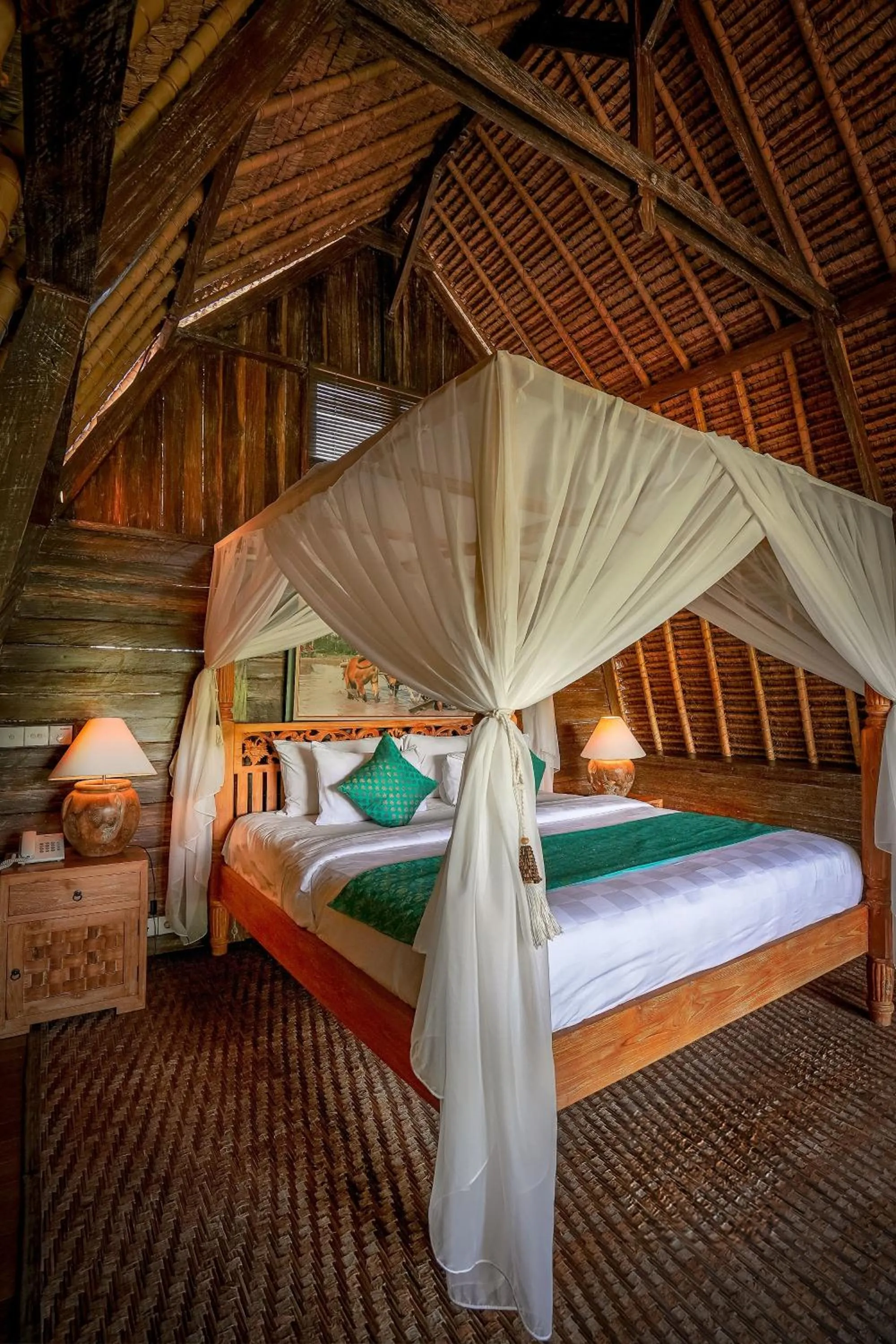 Bed in De Klumpu Bali Eco Tradi Stay
