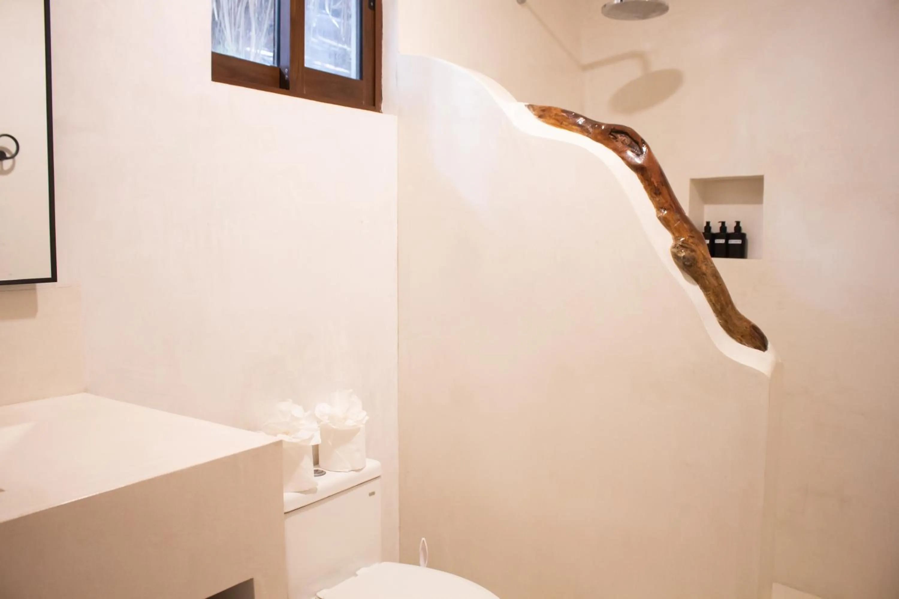 Shower in Dune Boutique Hotel located at the party zone