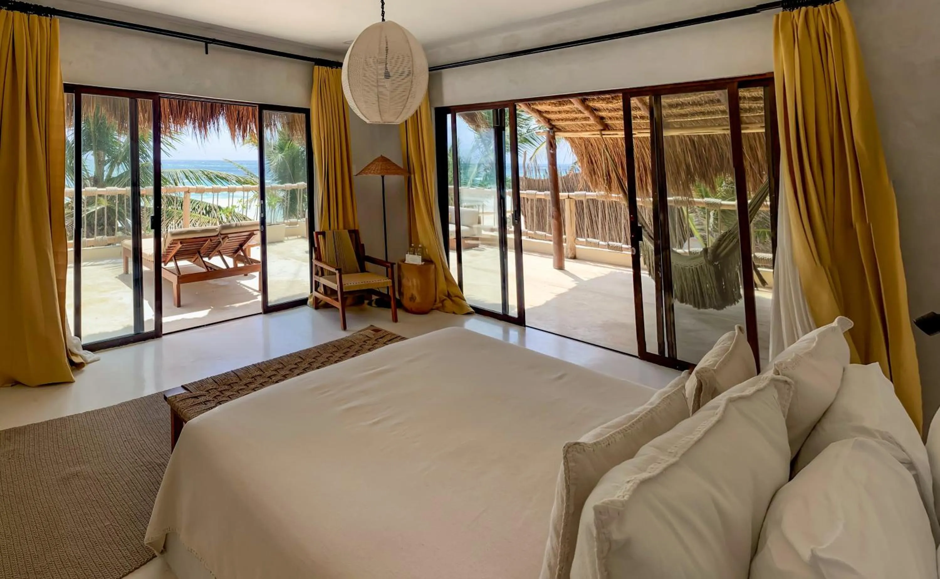 Bed in Dune Boutique Hotel located at the party zone