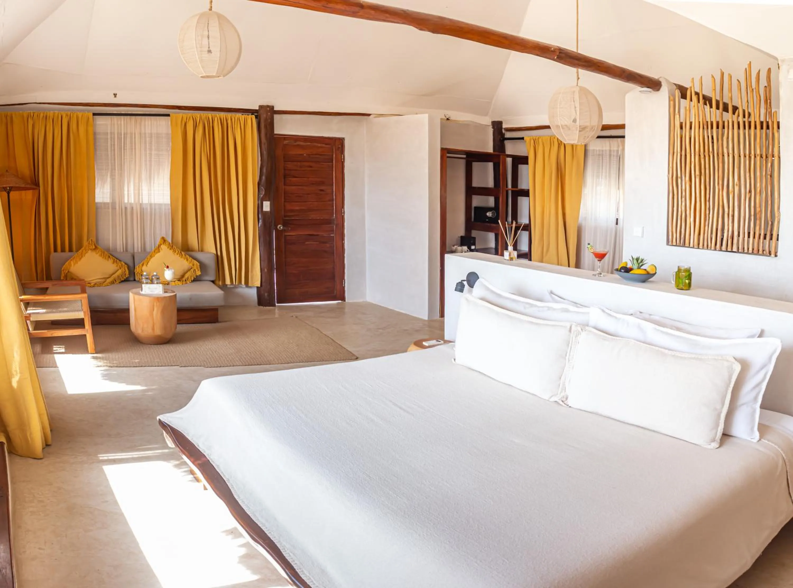 Bed in Dune Boutique Hotel located at the party zone