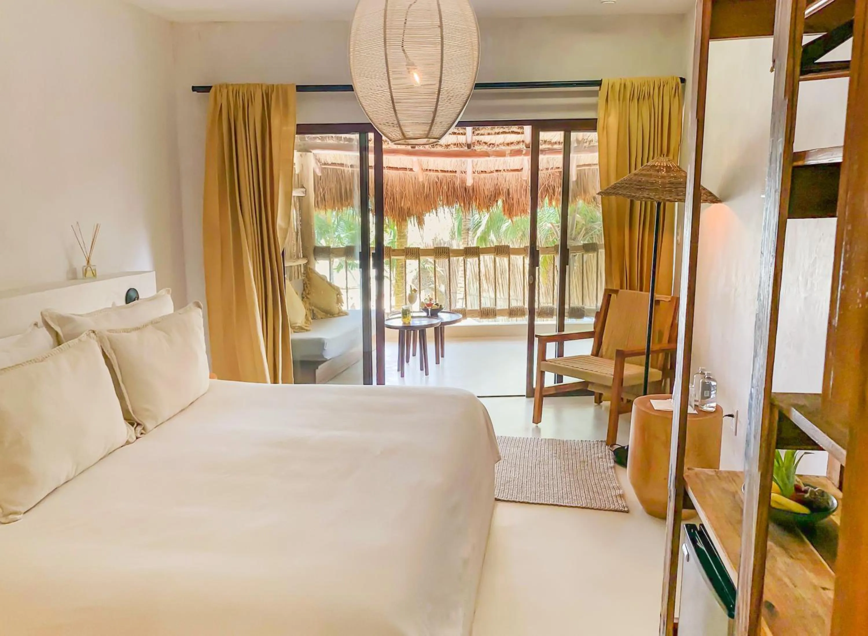 Bed in Dune Boutique Hotel located at the party zone