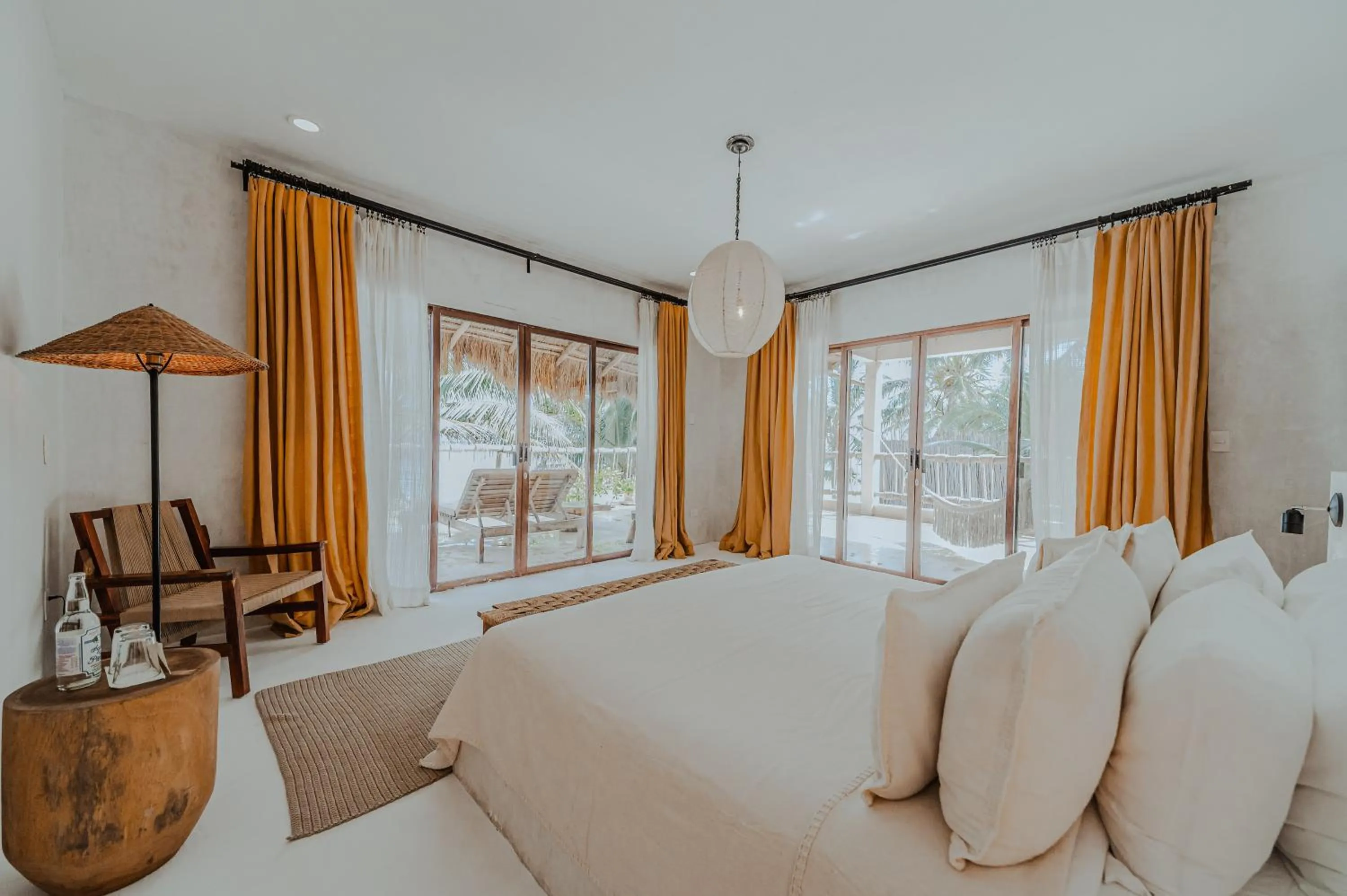 Bed in Dune Boutique Hotel located at the party zone