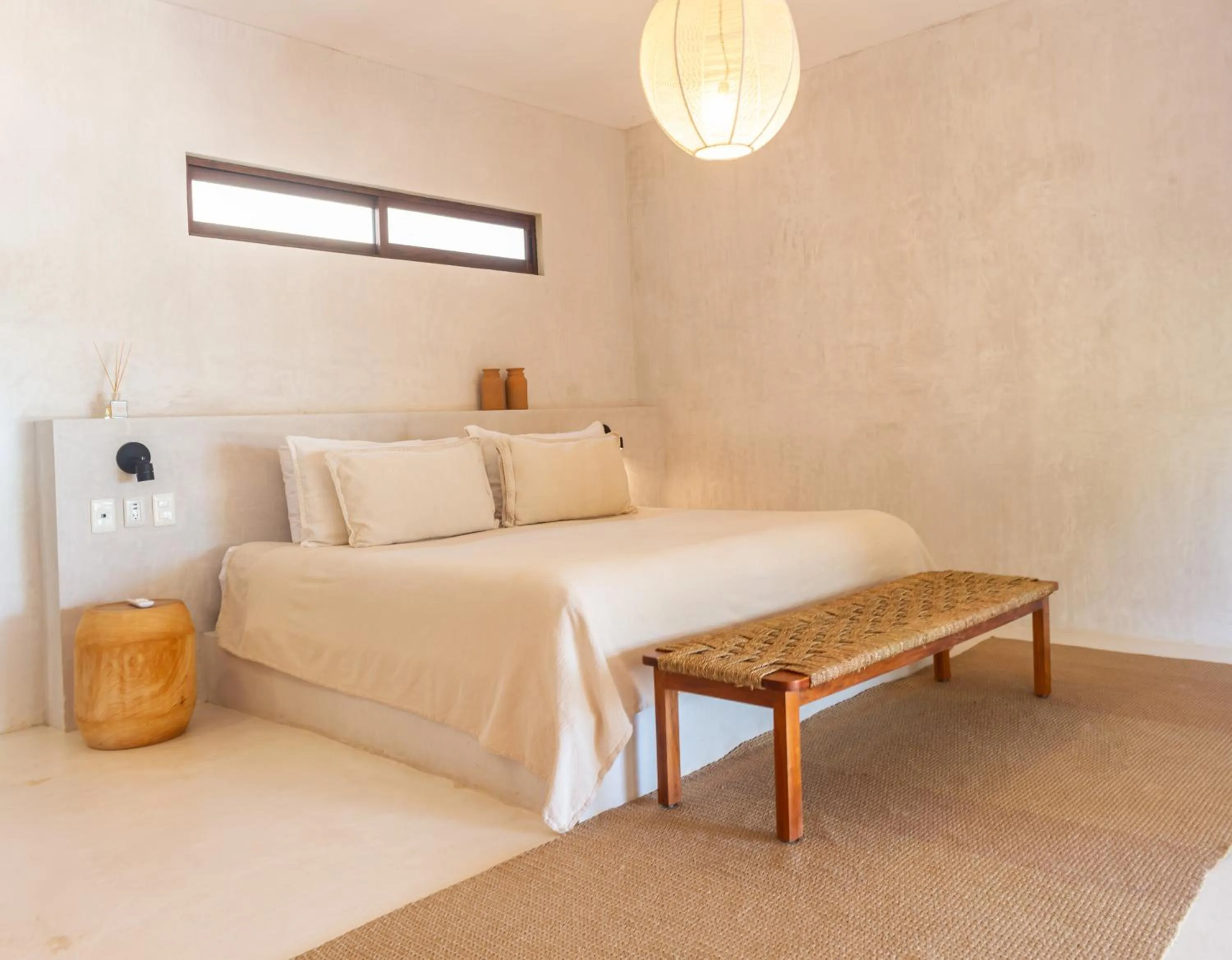 Bed in Dune Boutique Hotel located at the party zone