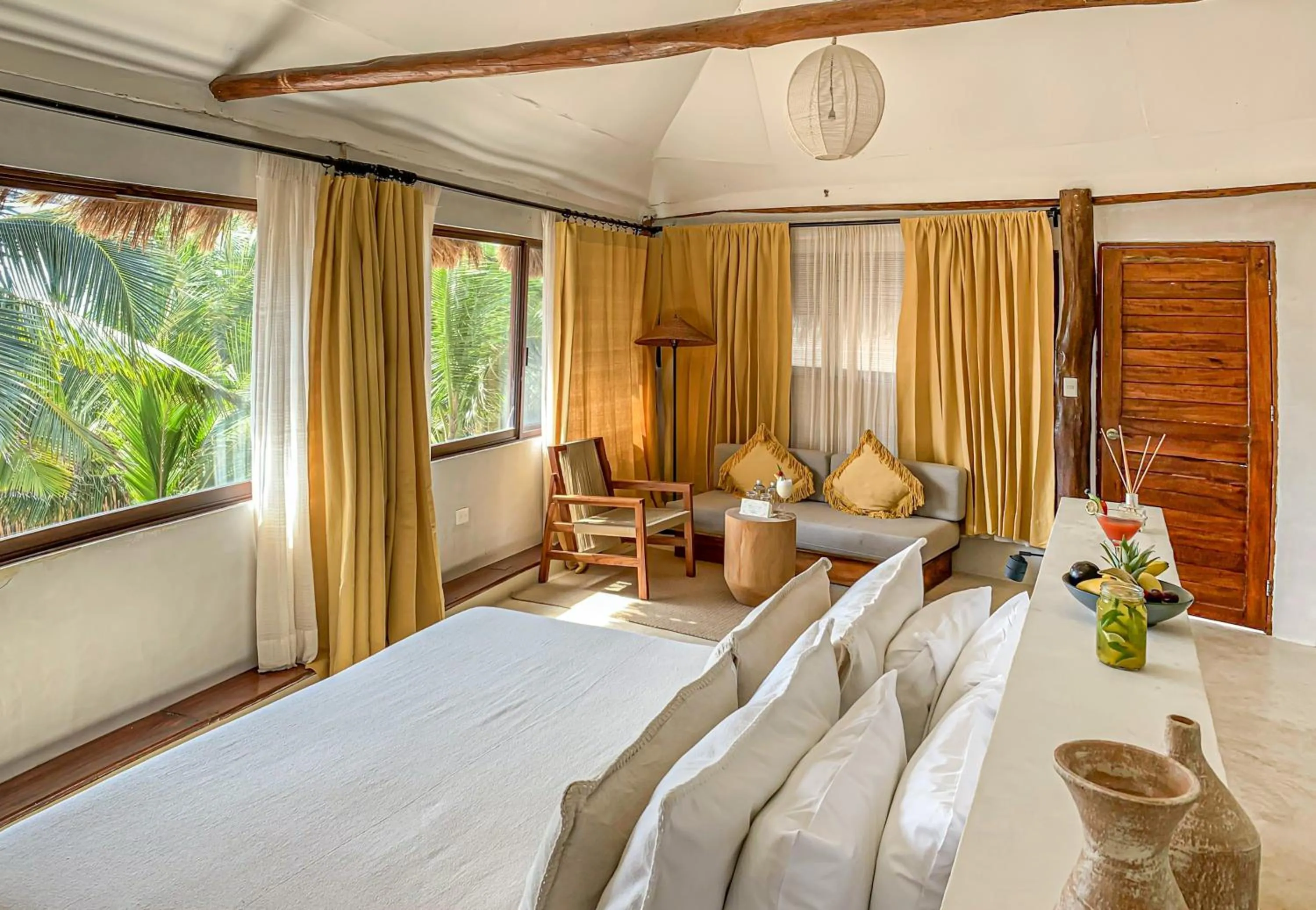 Bed in Dune Boutique Hotel located at the party zone