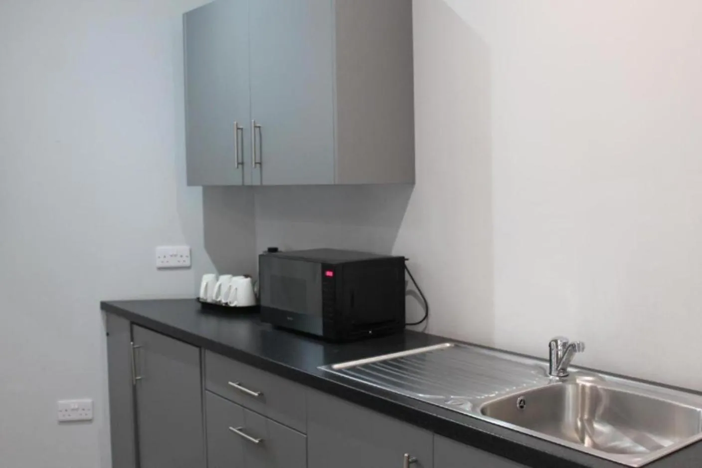 Kitchen or kitchenette in Crown Hotel & Bar