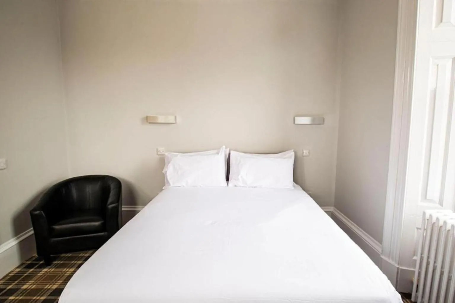 Bed in Crown Hotel & Bar