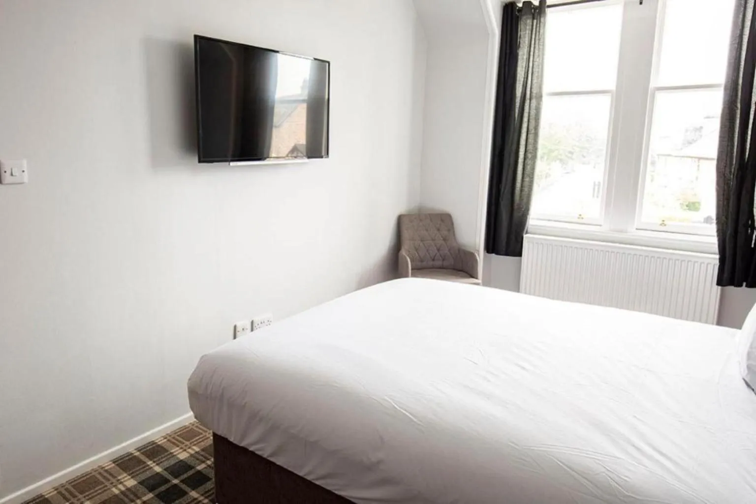 Bed in Crown Hotel & Bar