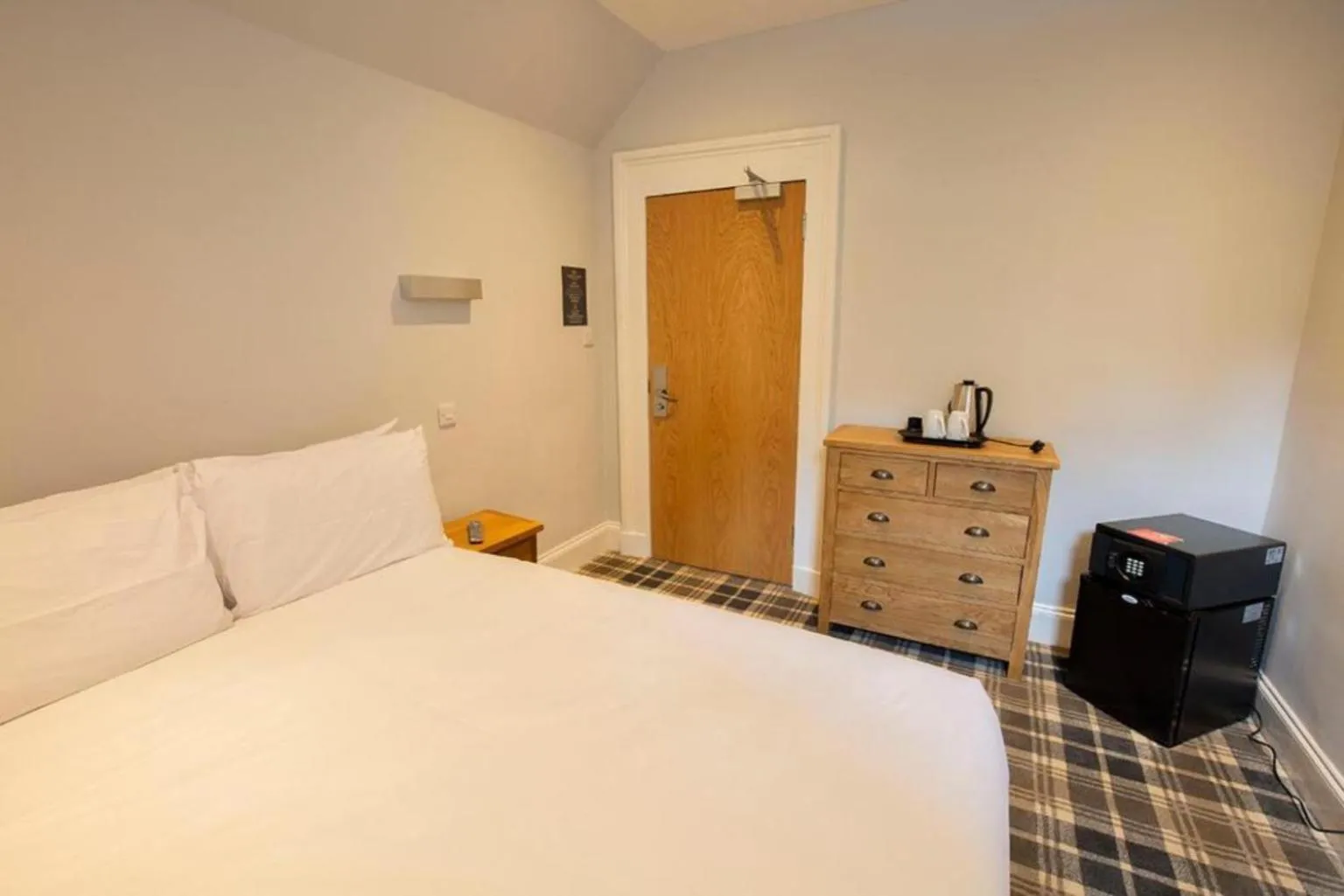 Bed in Crown Hotel & Bar