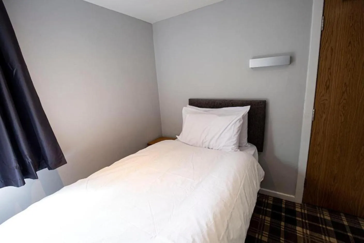 Bed in Crown Hotel & Bar