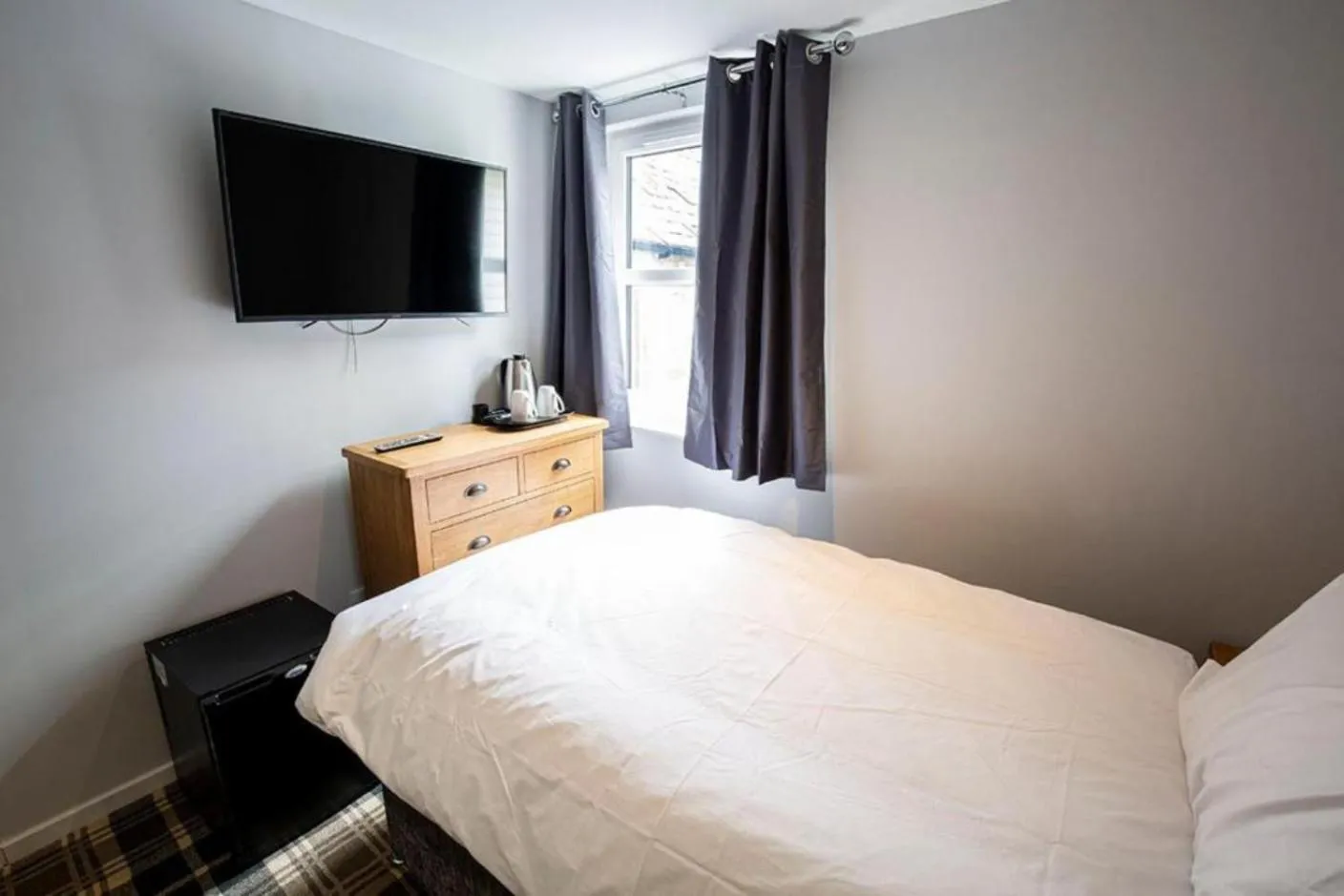 Bed in Crown Hotel & Bar
