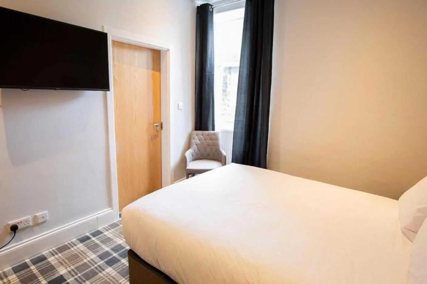 Bed in Crown Hotel & Bar