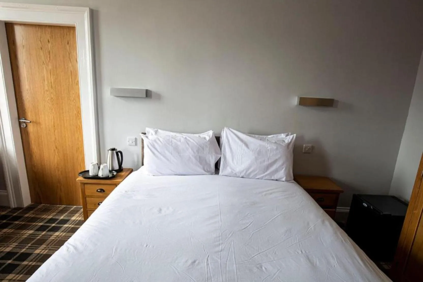 Bed in Crown Hotel & Bar