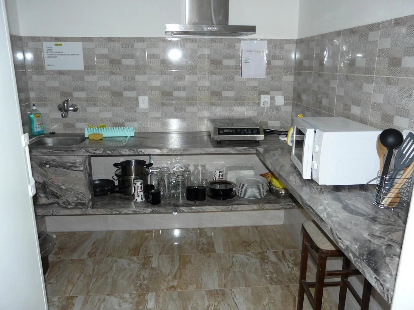 Kitchen or kitchenette in Hotel Olga