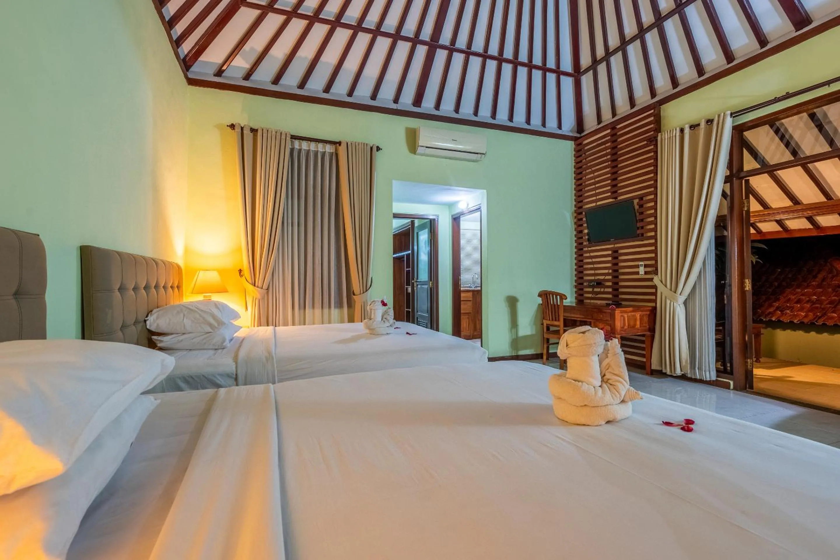 Bed in Taman Surgawi Resort & Spa