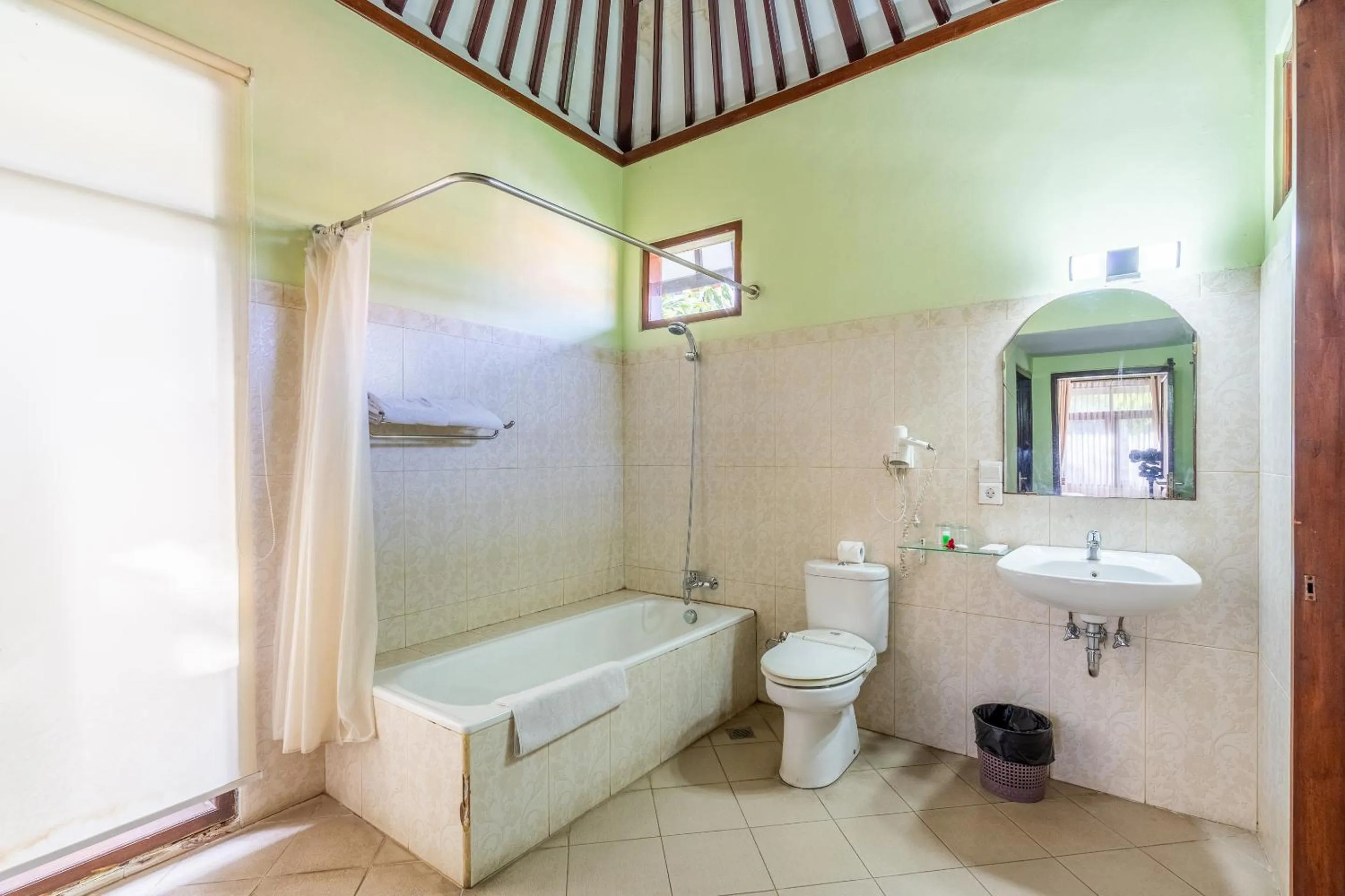 Toilet in Taman Surgawi Resort & Spa