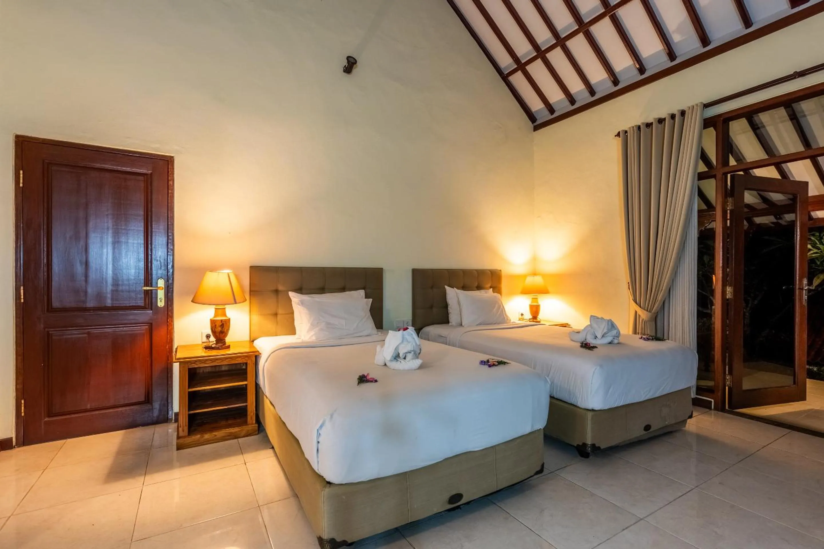 Bed in Taman Surgawi Resort & Spa