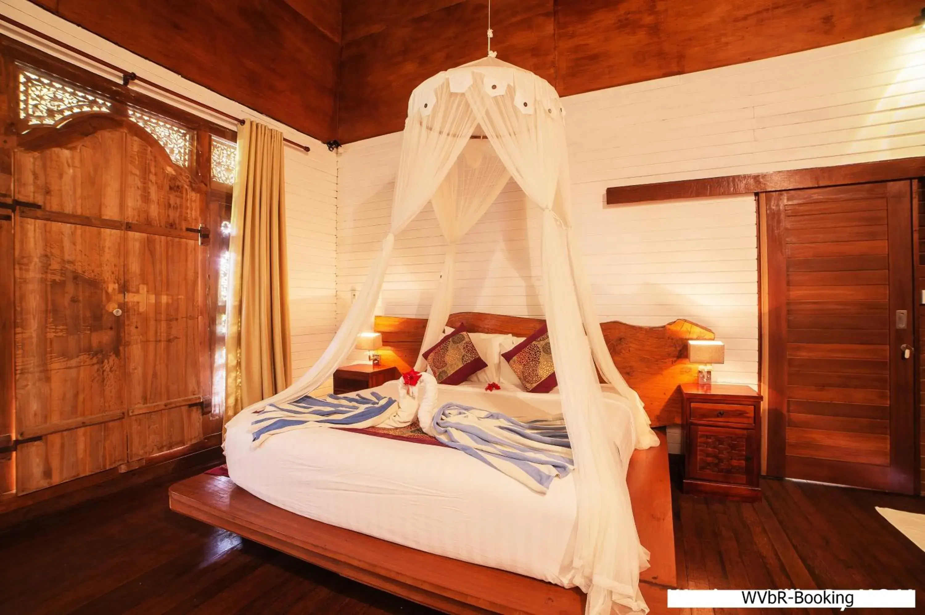 Bed in Warisan Villa By Reccoma Bed in Warisan Villa By Reccoma