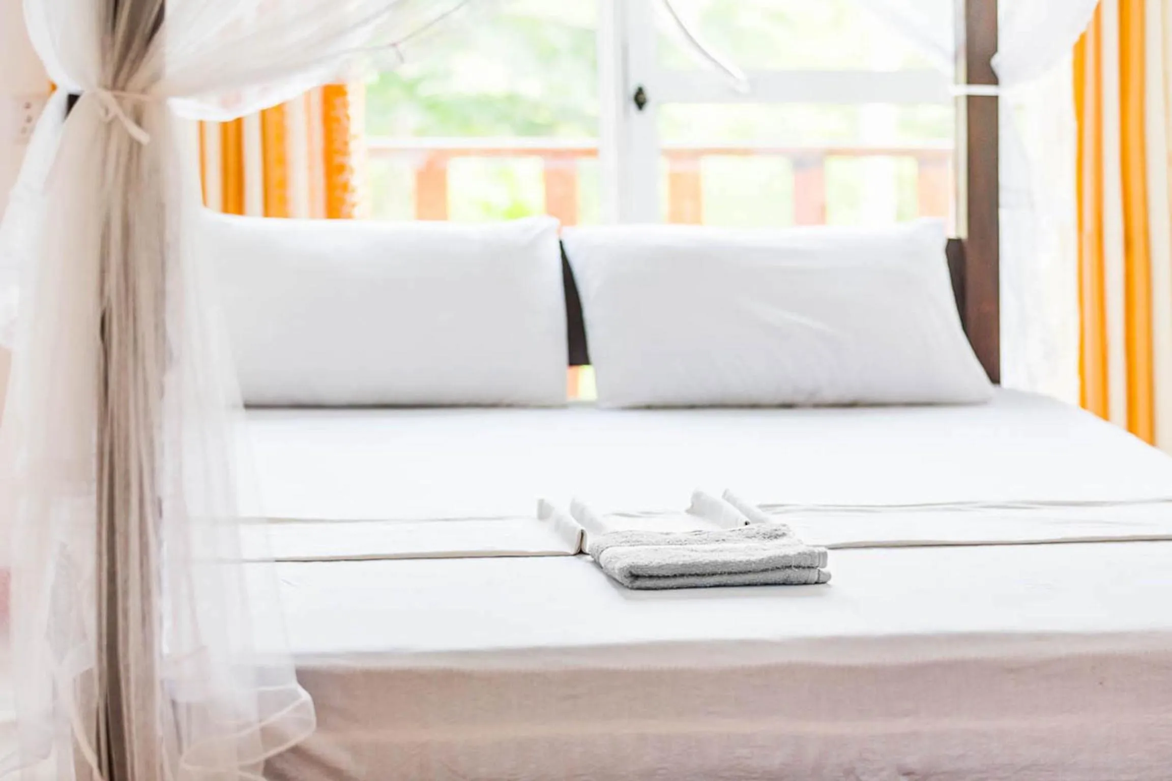 Bed in Cocoplant Surf Inn