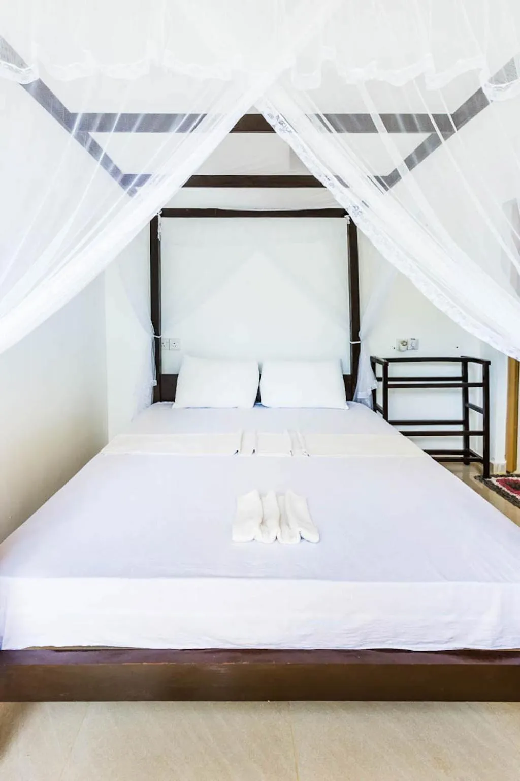 Bed in Cocoplant Surf Inn