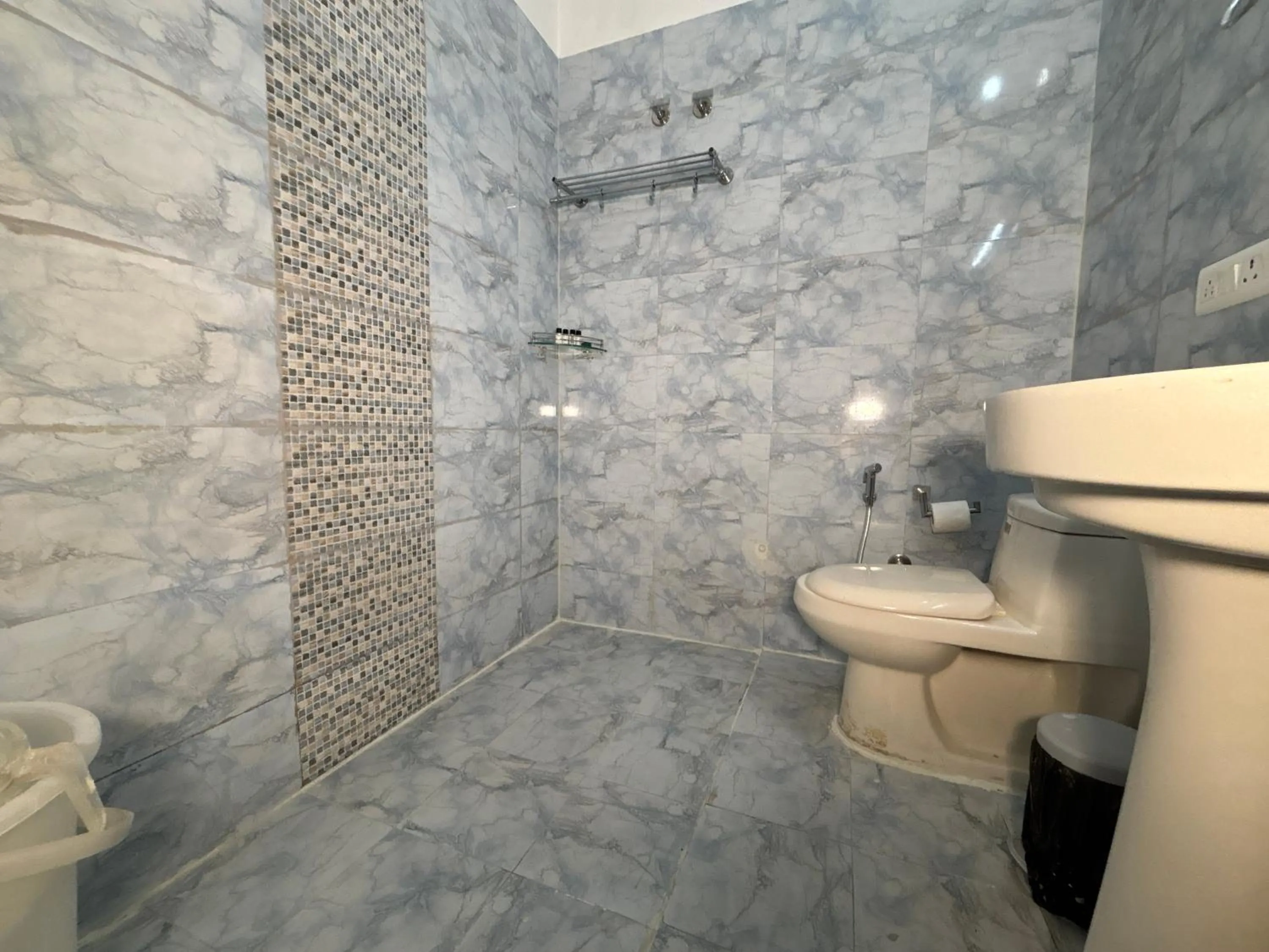 Shower in Vedas Tapovan