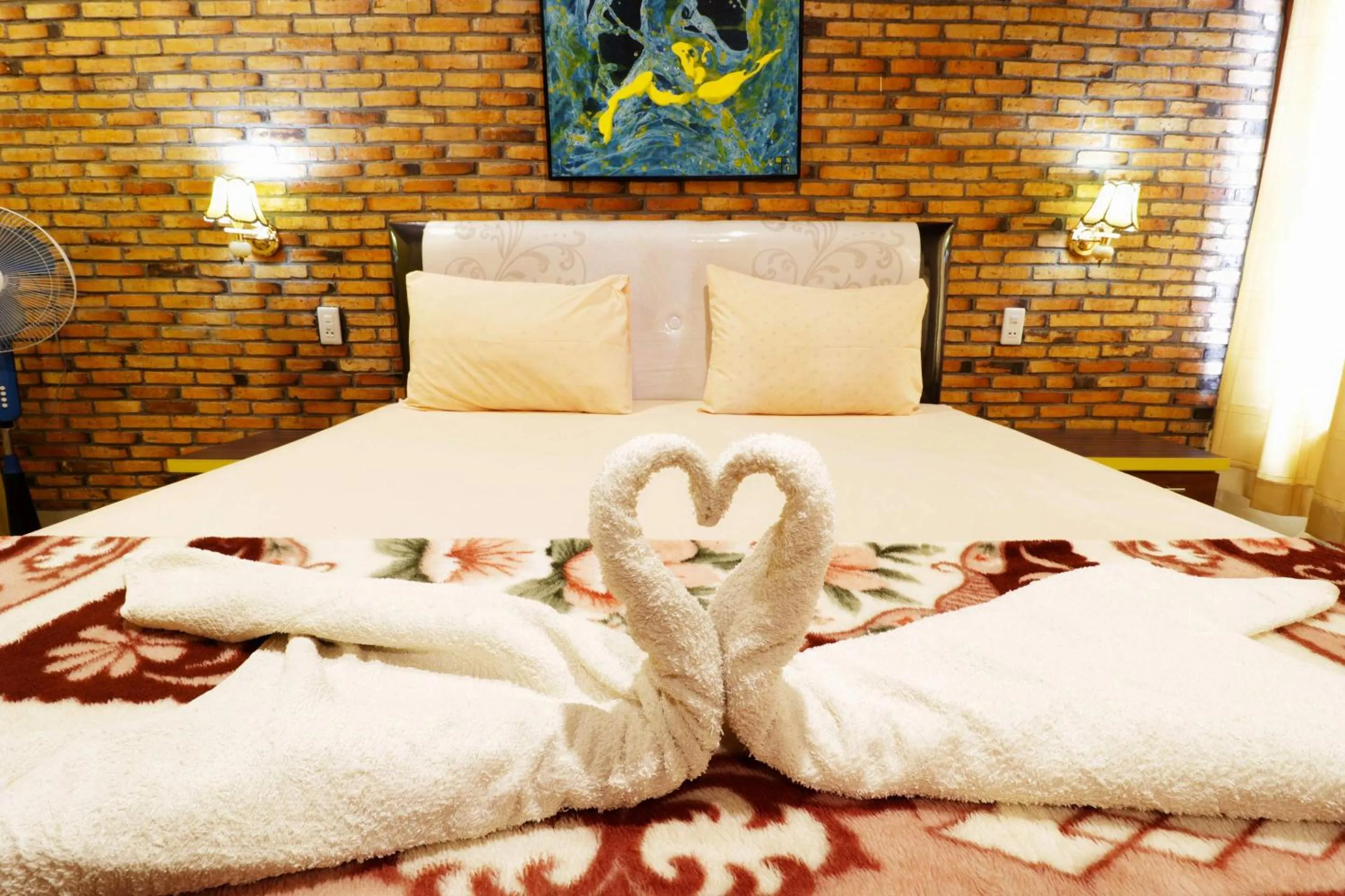 Bed in Tuk Tuk Timbul Bungalows