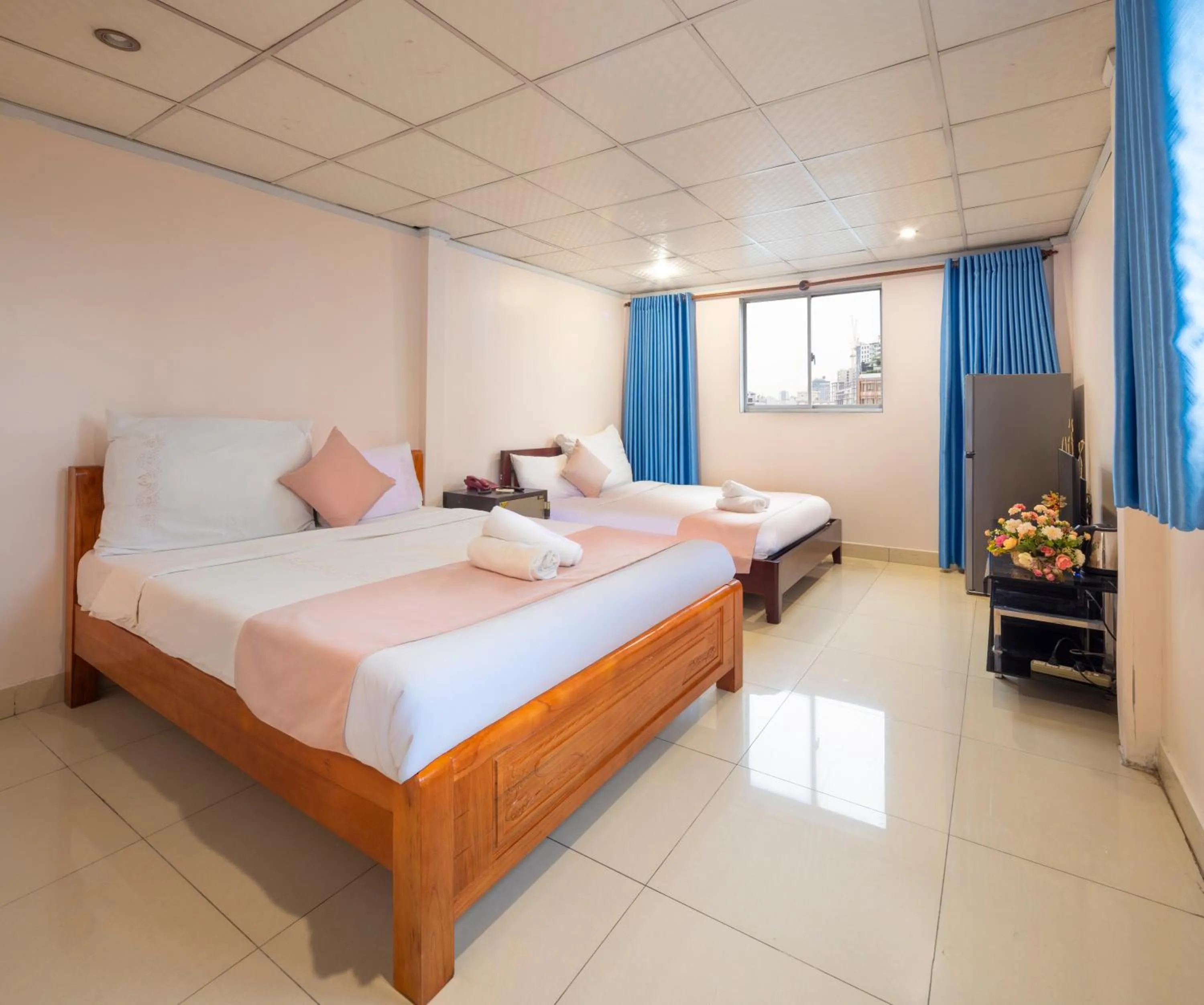 Bed in Saigon Pink Hotel