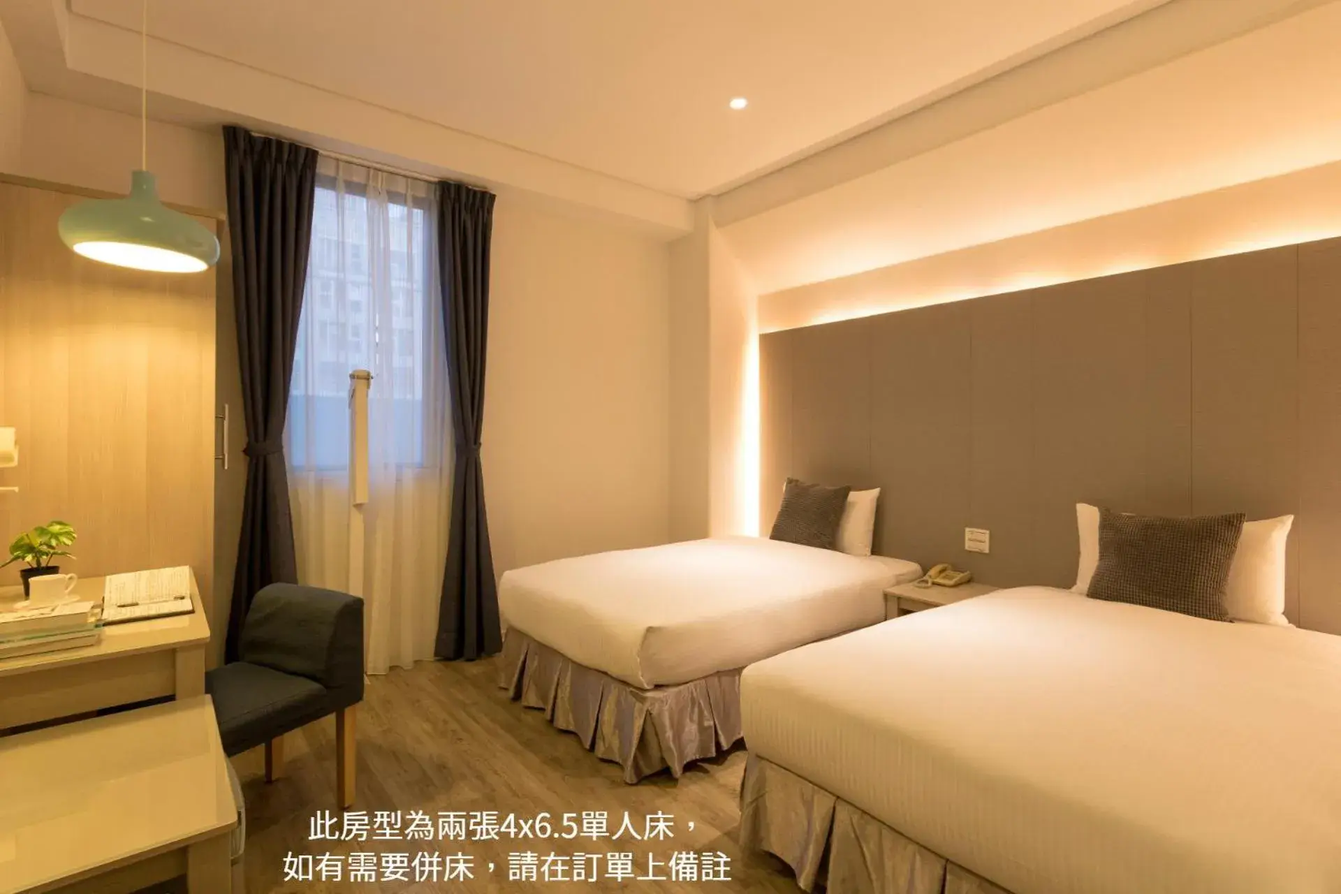 Bed in Just Enjoy Business Hotel Bed in Just Enjoy Business Hotel