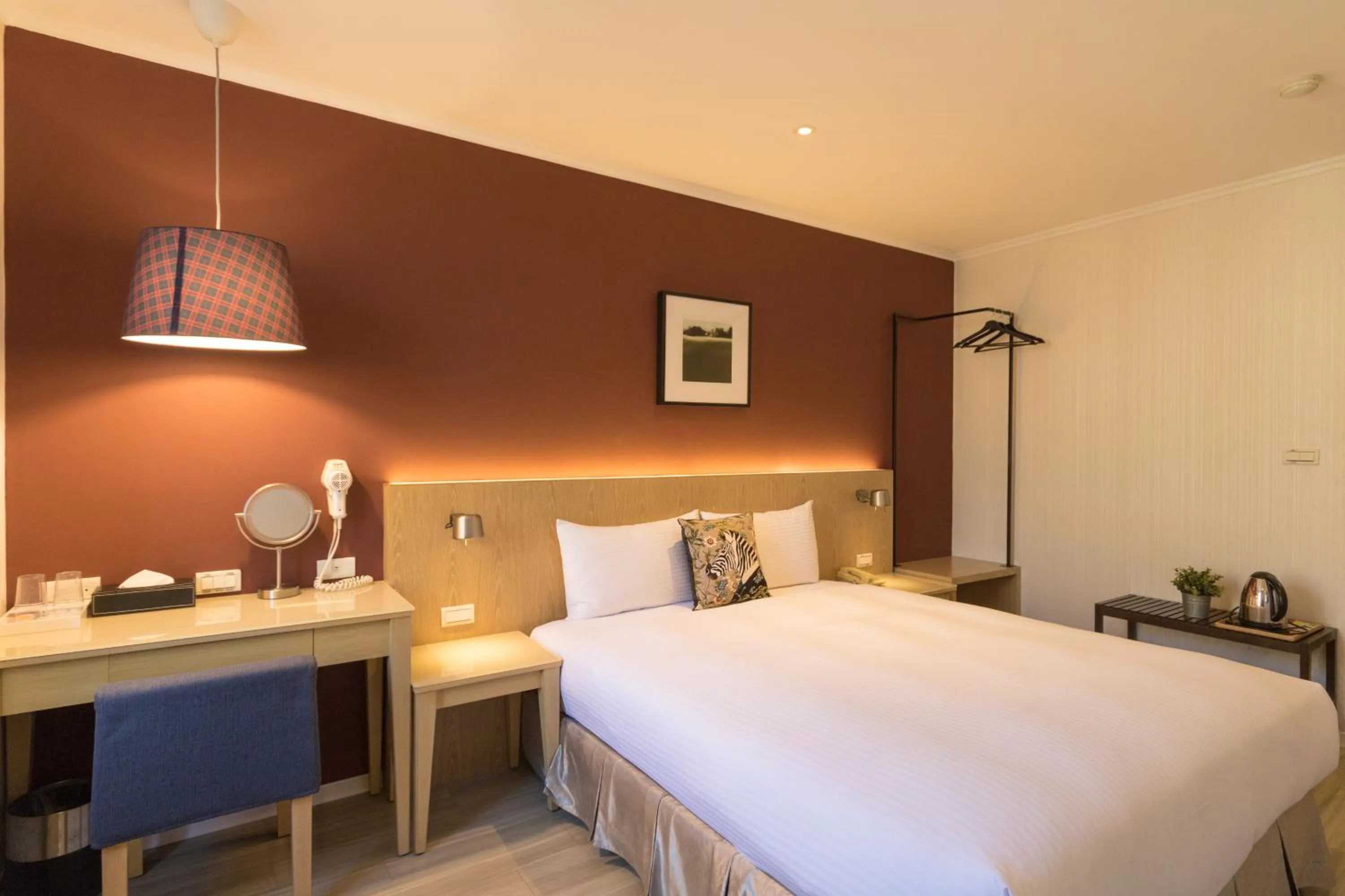 Bed in Just Enjoy Business Hotel