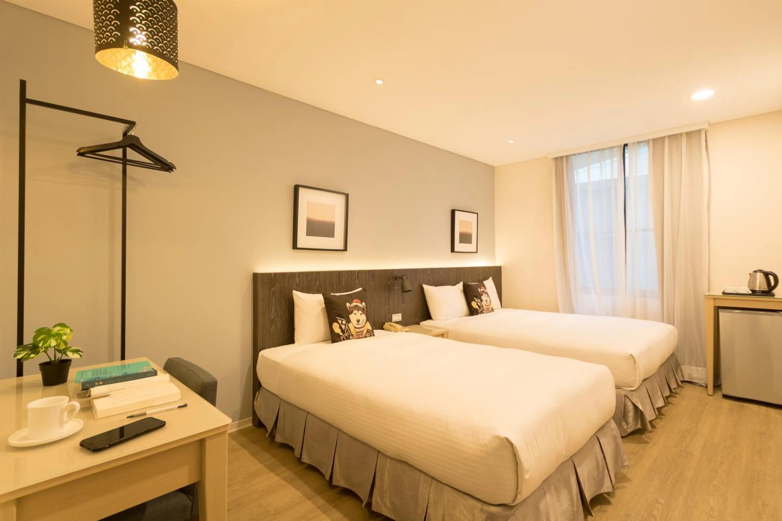 Bed in Just Enjoy Business Hotel